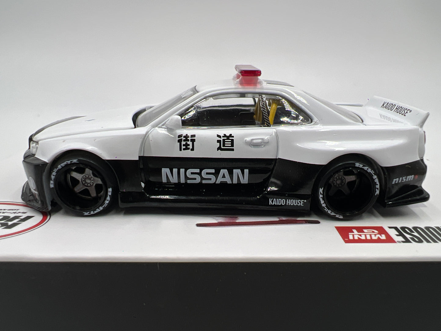 Mini GT x Kaido House #120 Nissan Skyline GT-R R34 Kaido Works V2 Aero Japan Police