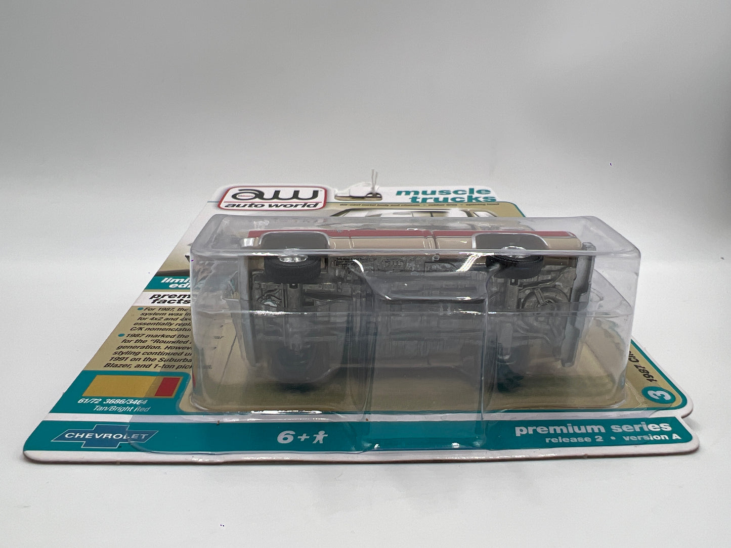 Auto World Muscle Trucks Release 2 Version A 1987 Chevy Silverado R10 Fleetside Tan/Red 182E