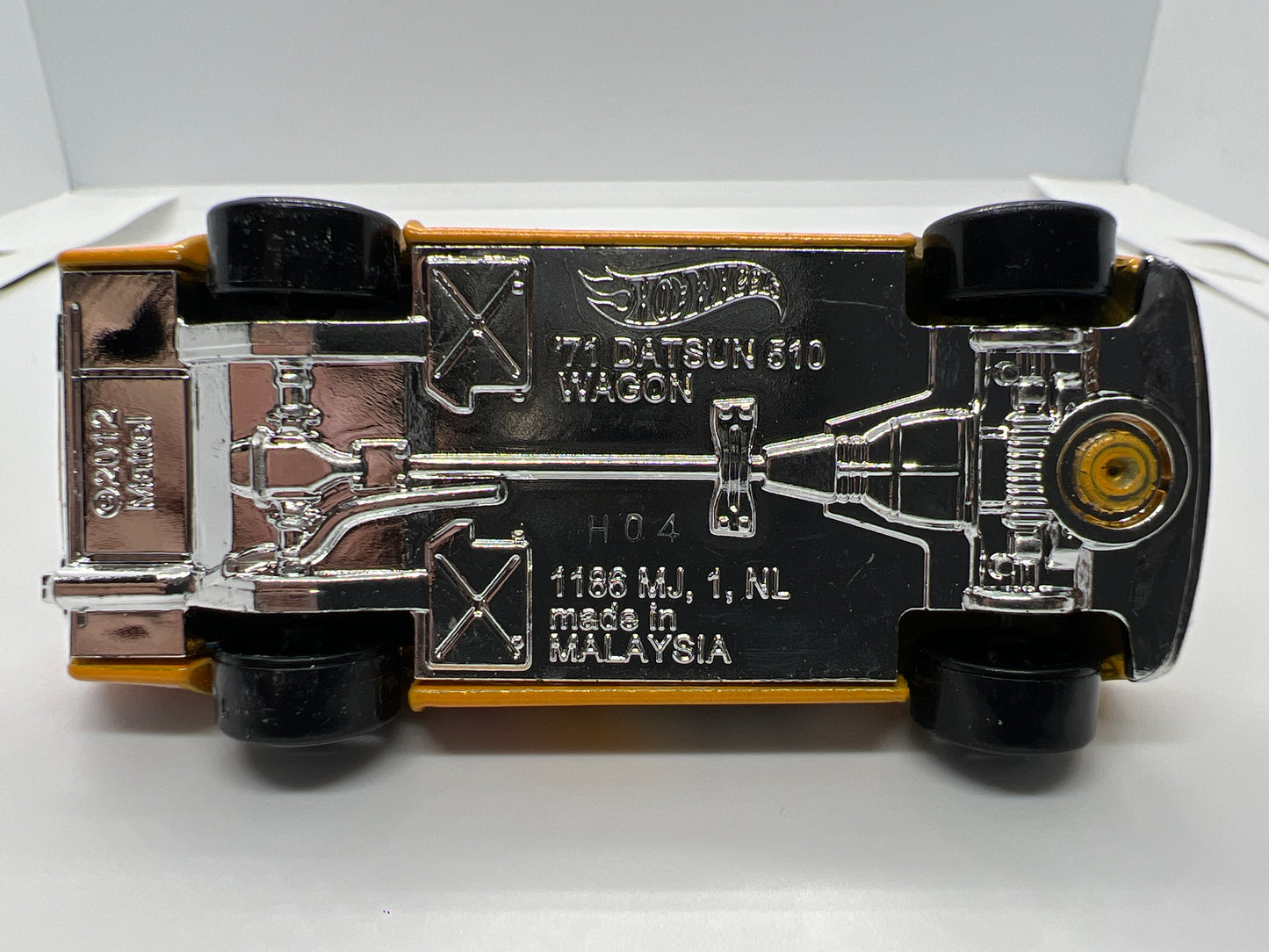 Hot Wheels 1/64 Mainline 71 Datsun 510 Wagon Yellow Loose