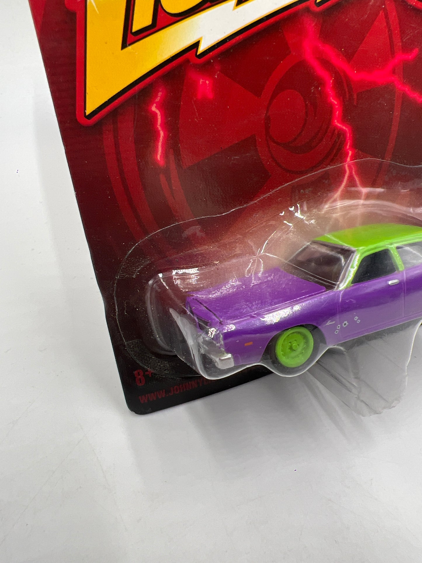 Johnny Lightning Small Card 1977 Dodge Monaco Joker Goon W/Protector 1