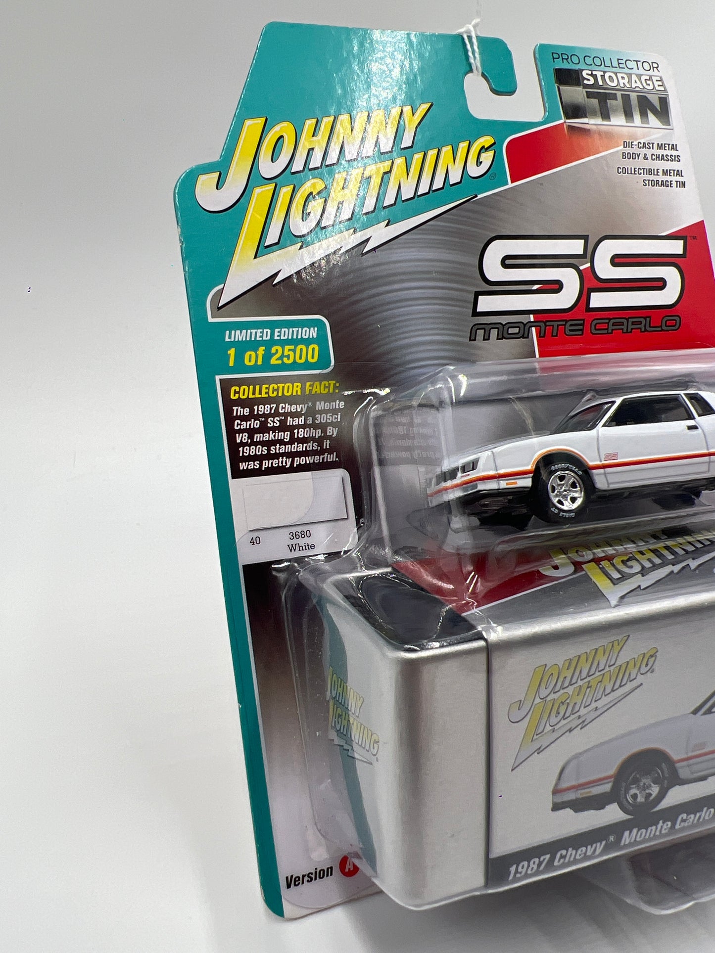 Johnny Lightning Storage Tin Release 1 Version A 1987 Chevy Monte Carlo SS White 1/2500