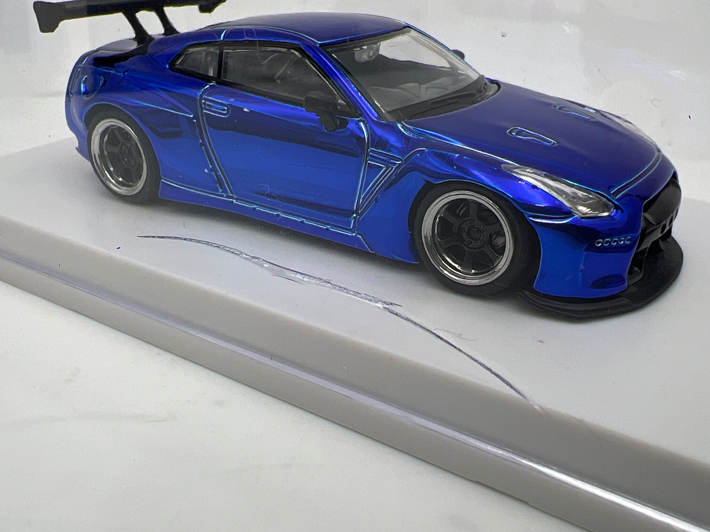 LMLF Models 1/64 #143/499 Nissan GT-R Skyline Chrome Blue Cracked Case