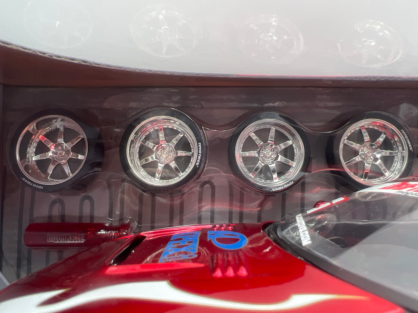 Jada 1:18 Scale Import Racer Toyota Supra Red W/Extra Wheels & Hood