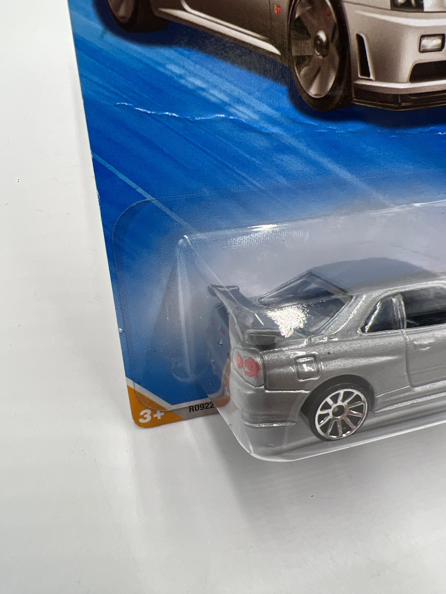 2010 Hot Wheels New Models #007 Nissan Skyline GT-R R34 Silver HTF W/Protector *Bad Card*