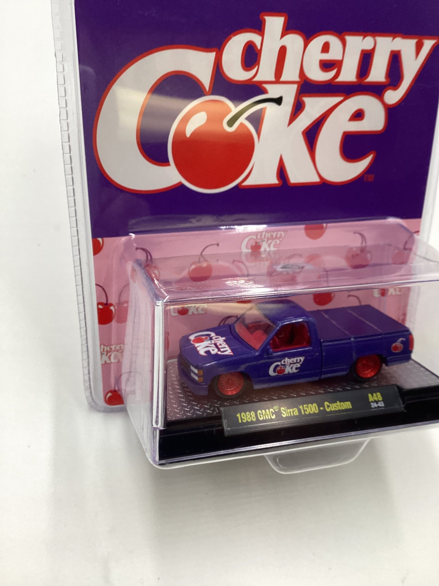 2024 M2 Machines Cherry Coke (Sirra Error) CHASE 1988 GMC Sierra 1500 Custom Purple A48