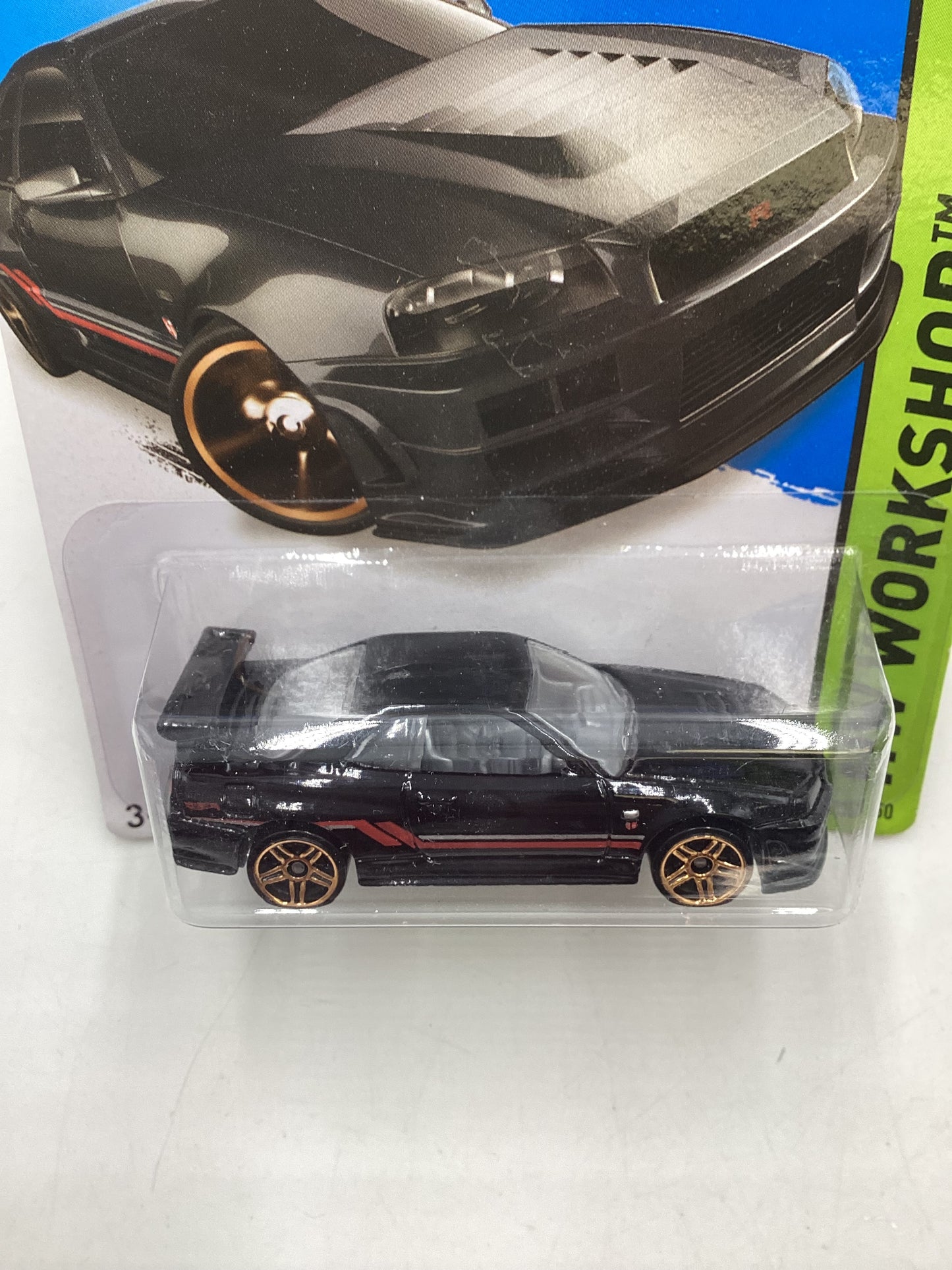 2014 Hot Wheels #230 Nissan Skyline GT-R (R34) Black with Protector