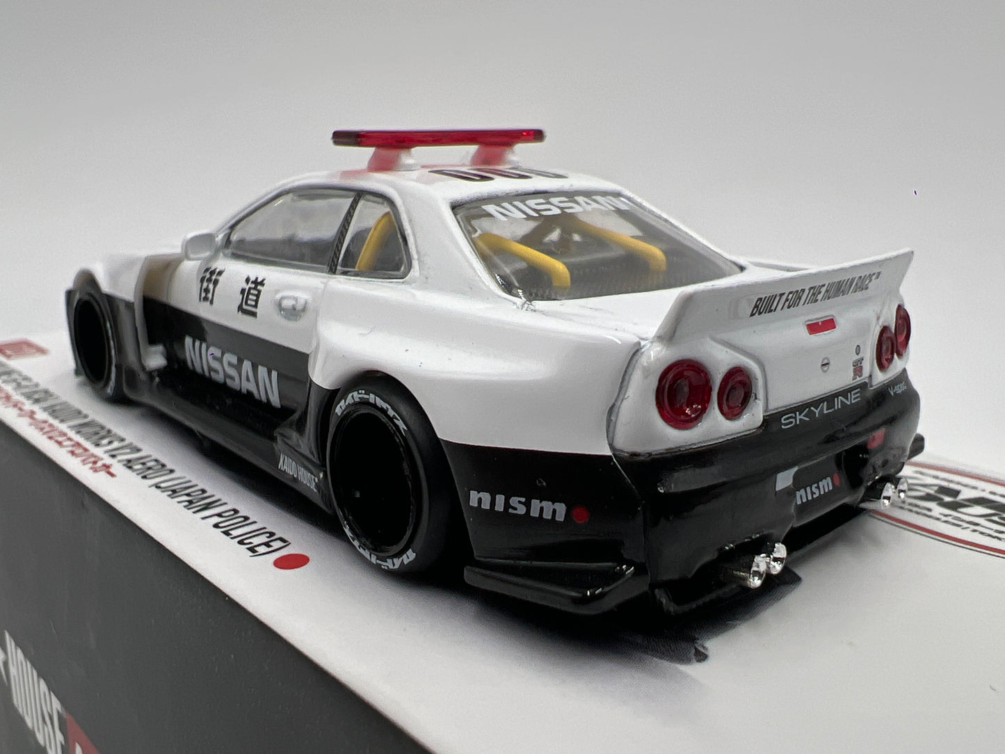 Mini GT x Kaido House #120 Nissan Skyline GT-R R34 Kaido Works V2 Aero Japan Police