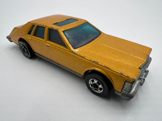 Hot Wheels 1/64 Blackwall Cadillac Seville Gold Loose