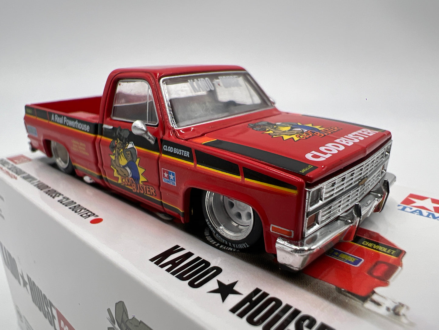 Mini GT x Kaido House #130 Chevrolet Silverado Tamiya x Kaido House Clod Buster Orange
