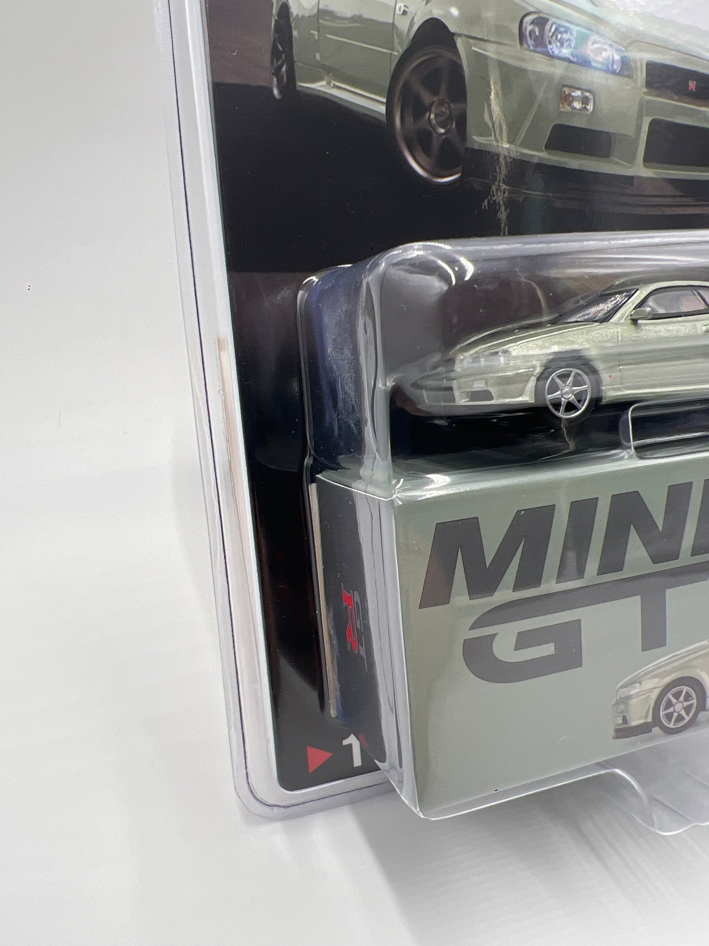 Mini GT #1003 Nissan Skyline GT-R R34 V-Spec II Nur Millenium Jade