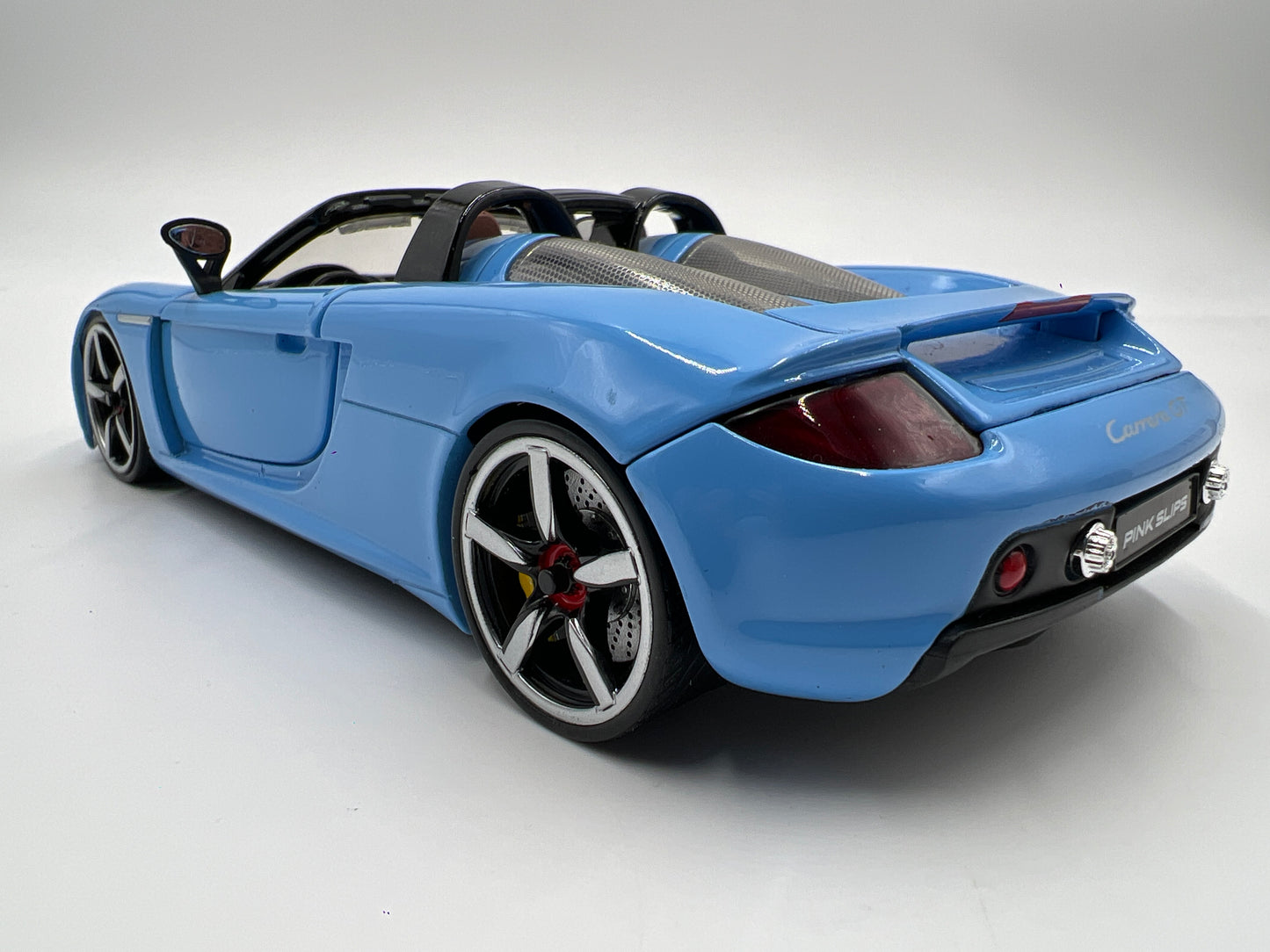 Jada Toys 1/24 Scale Pink Slips Porsche Carrera GT Light Blue Loose