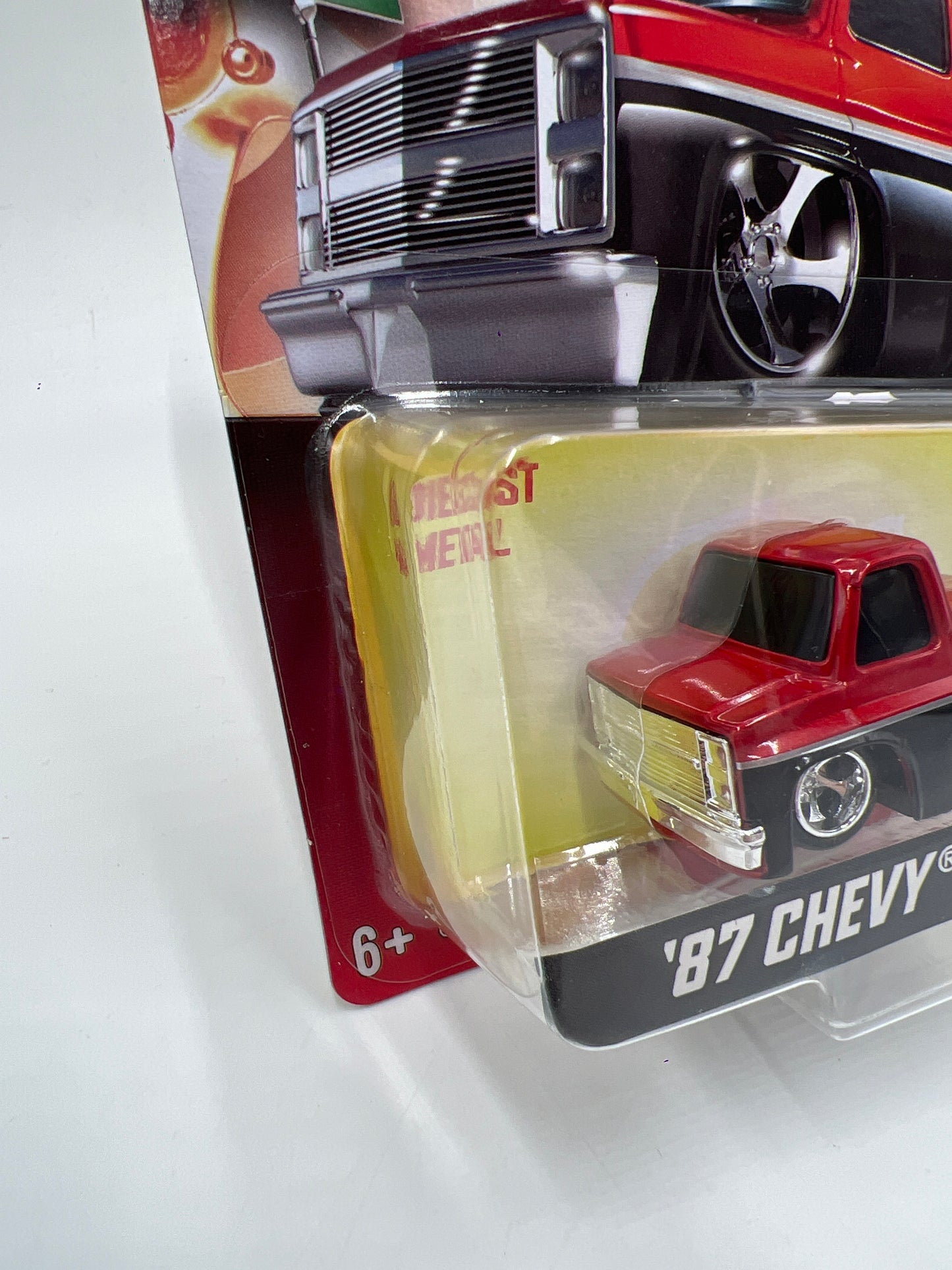 MGA Car Tuned Series 2 #8 87 Chevy C10 Red/Black