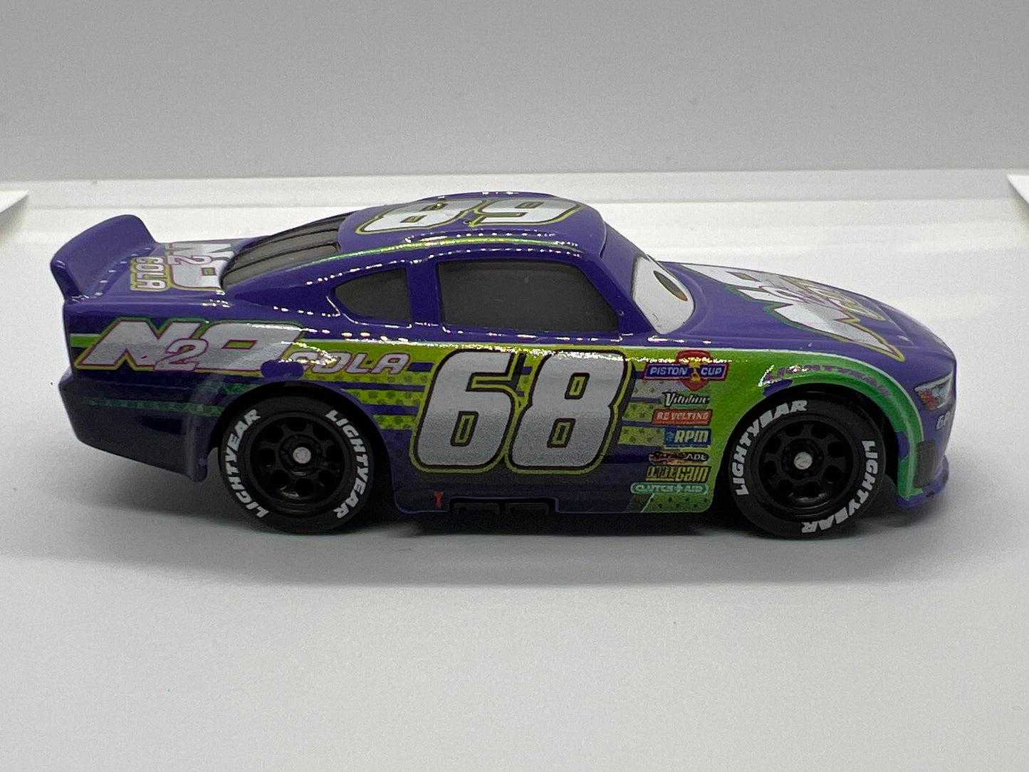 Disney Pixar Cars 3 #68 Parker Brakeston N20 Cola Purple Loose