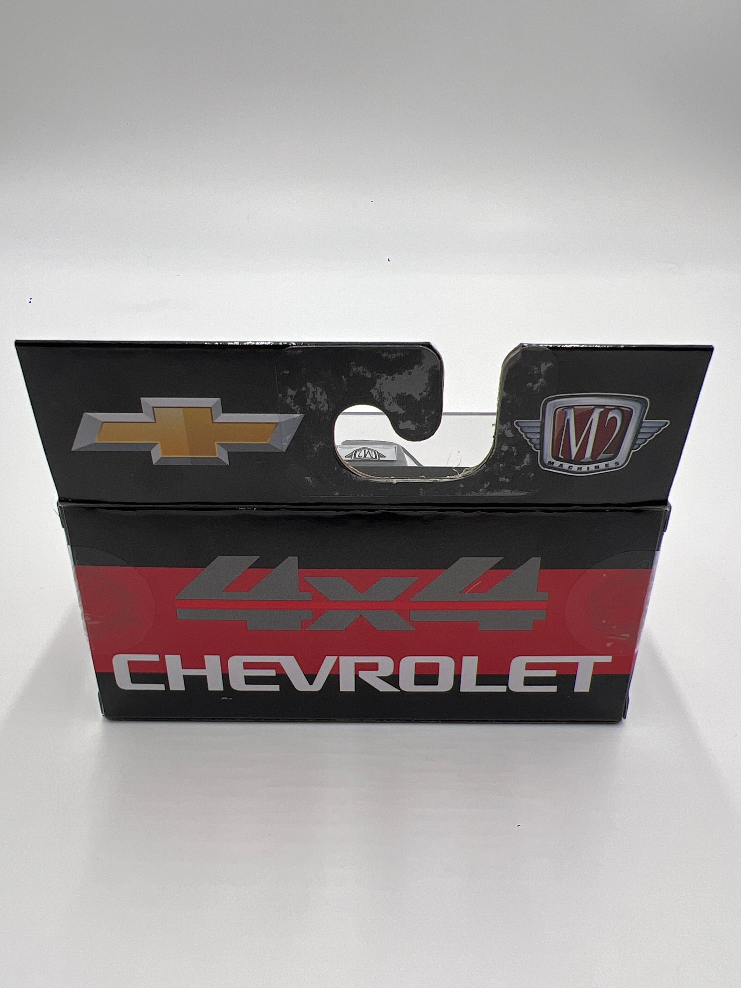 2024 M2 Machines 1993 Chevrolet Silverado 1500 4x4 Black/Red R82