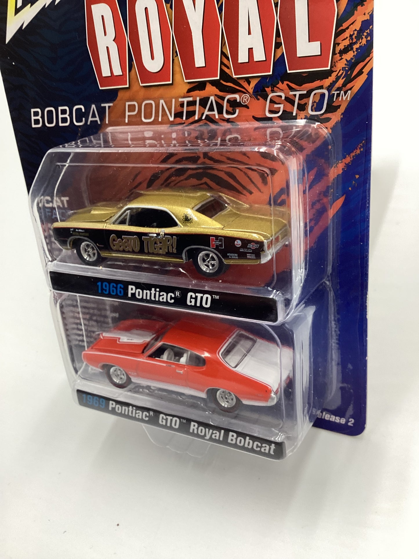 Johnny Lightning Royal Bobcat Pontiac GTO Release 2 Version B 1966 Pontiac GTO Gold/ Black 1969 Pontiac GTO Royal Bobcat Orange 231D
