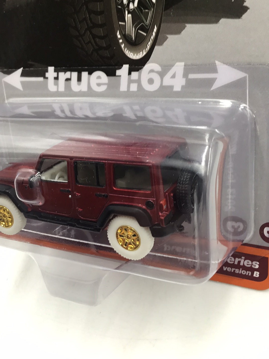 Auto world 2013 Jeep Wrangler Unlimited MOAB Edition ultra red chase