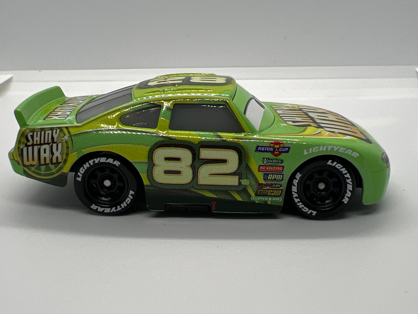 Disney Pixar Cars #82 Darren Leadfoot Shiny Wax Green Loose