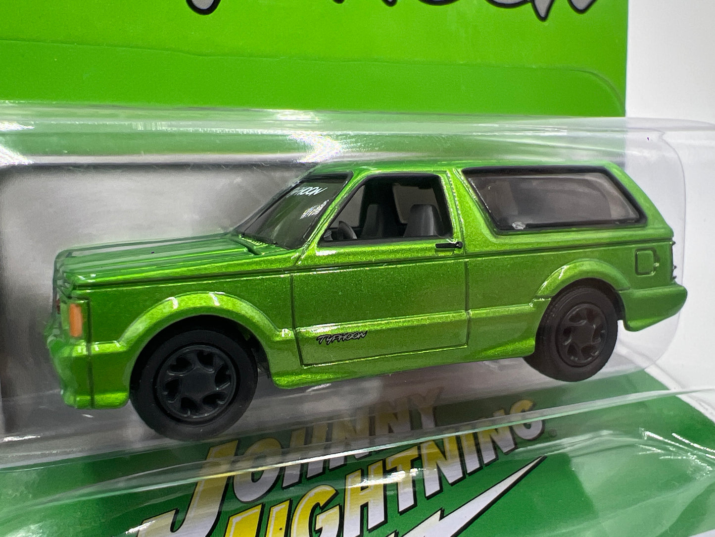 2025 Johnny Lightning Pro Collector Series Release 1 Version B 1992 GMC Typhoon Green W/Storage Tin
