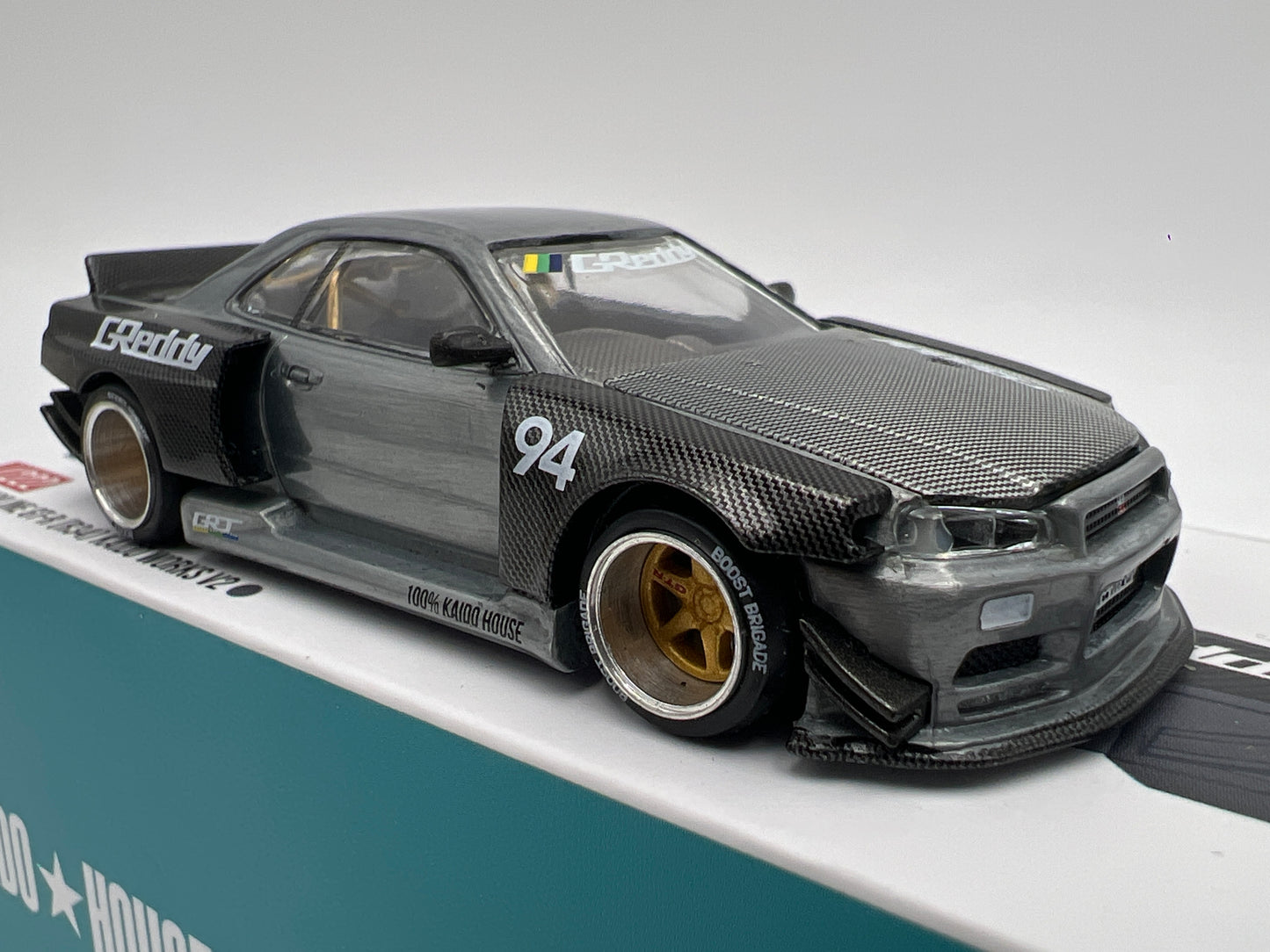 Mini GT Kaido House #222 CHASE Nissan Skyline GT-R R34 Kaido Works Carbon V2 GReddy