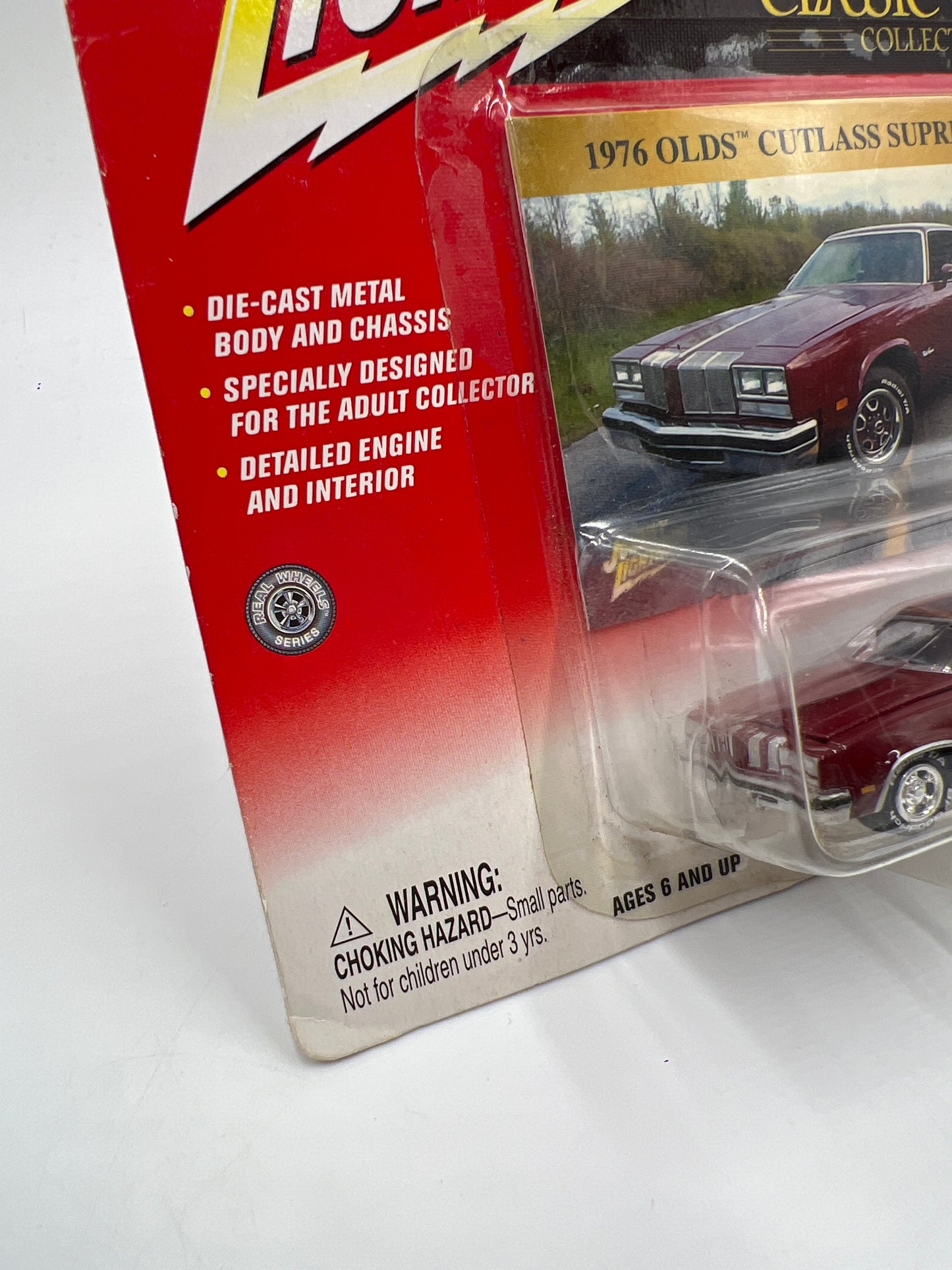 Johnny Lightning Classic Gold Collection 1976 Olds Cutlass Supreme Maroon 222F
