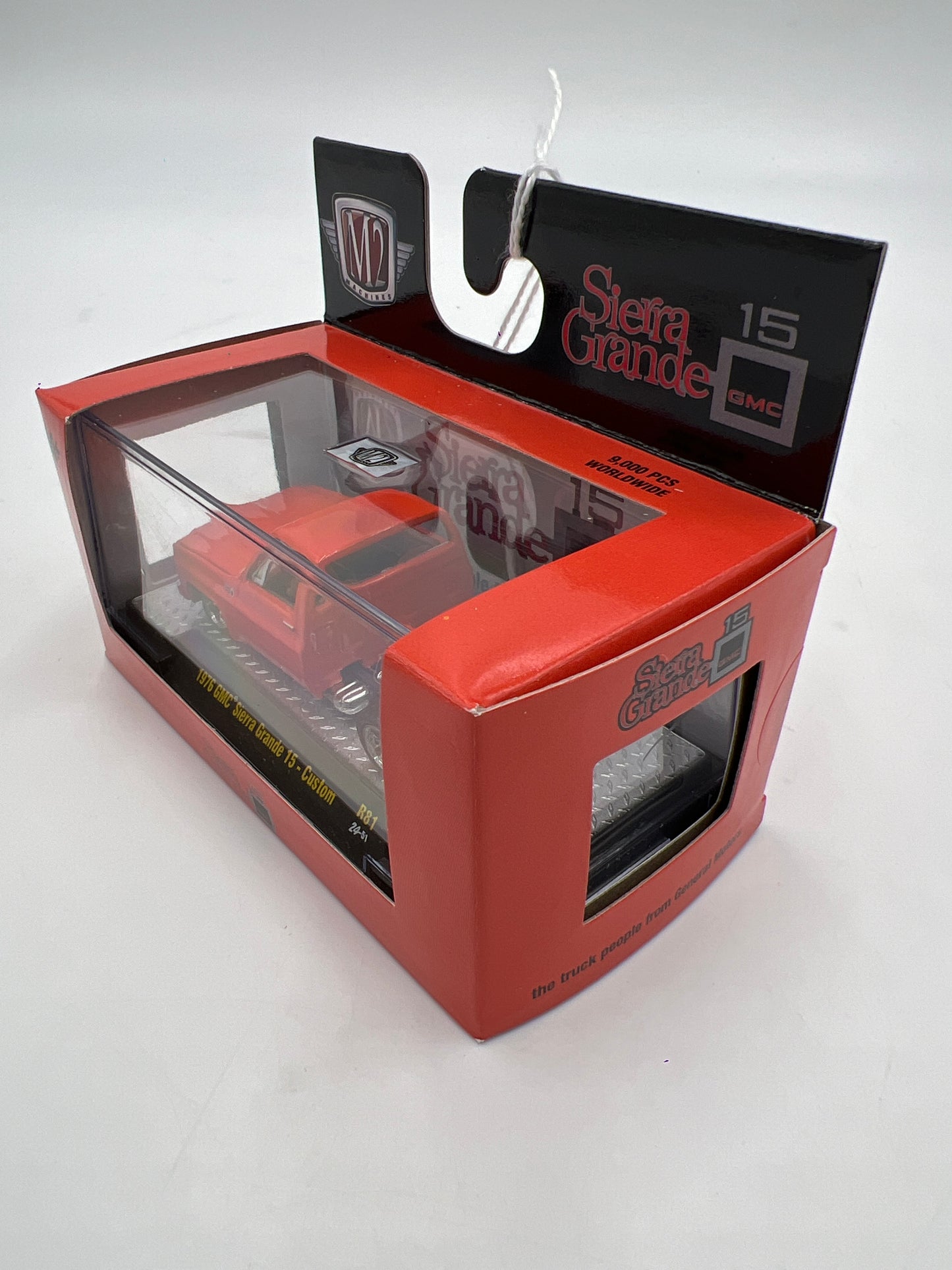 2024 M2 Machines 1976 GMC Sierra Grande 15 Orange Custom R81
