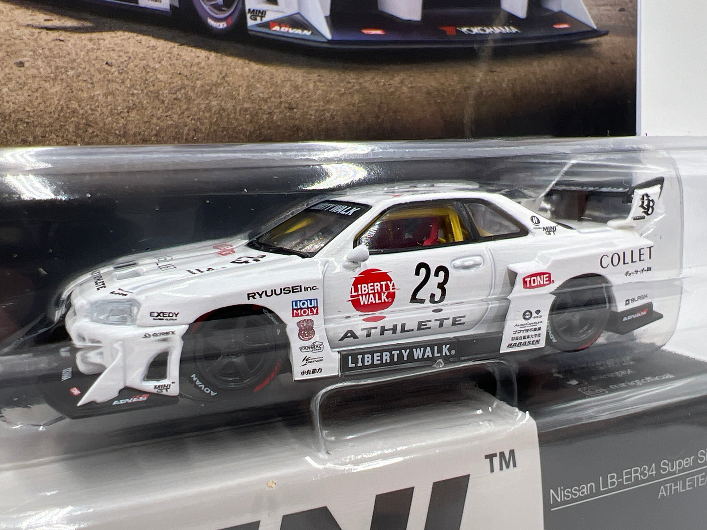 Mini GT #1059 Nissan LB-ER34 Super Silhouette Athlete/Collet White