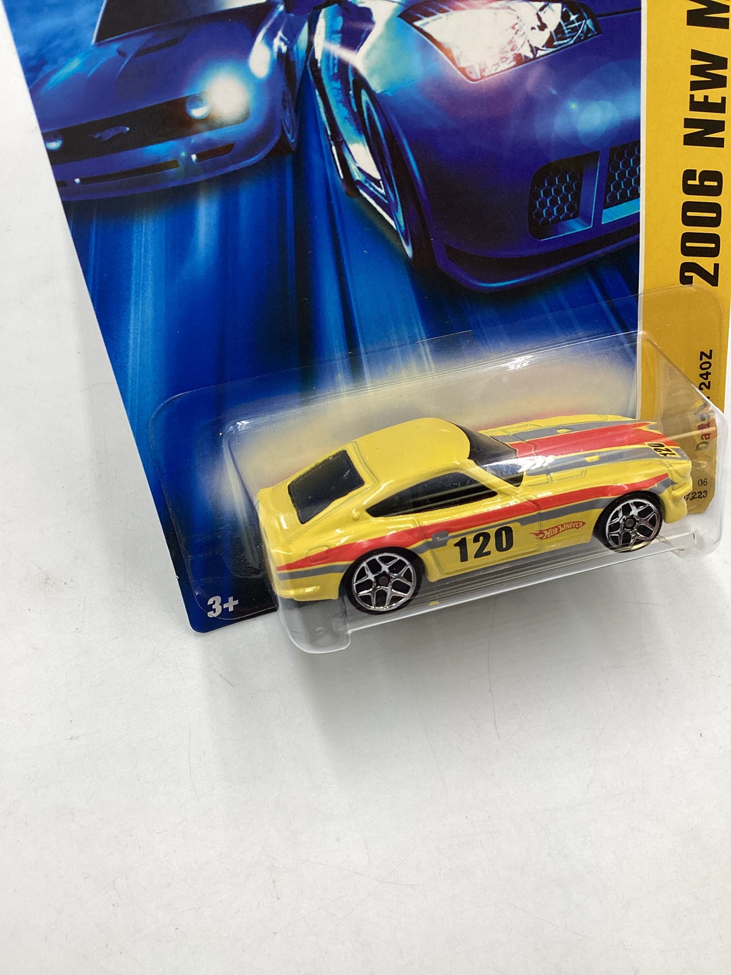 2006 Hot Wheels #036 Yellow Datsun 240Z 80D