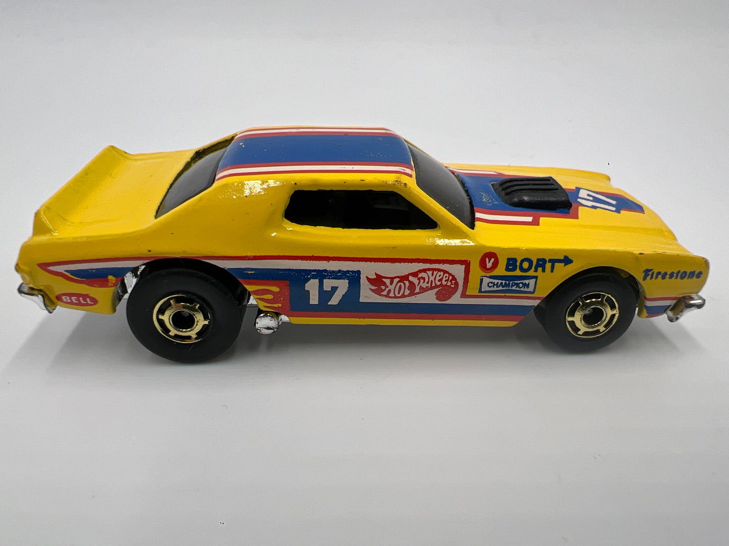 Hot Wheels 1/64 Vintage The Hot Ones Torino Stocker Malaysia Base Yellow Loose