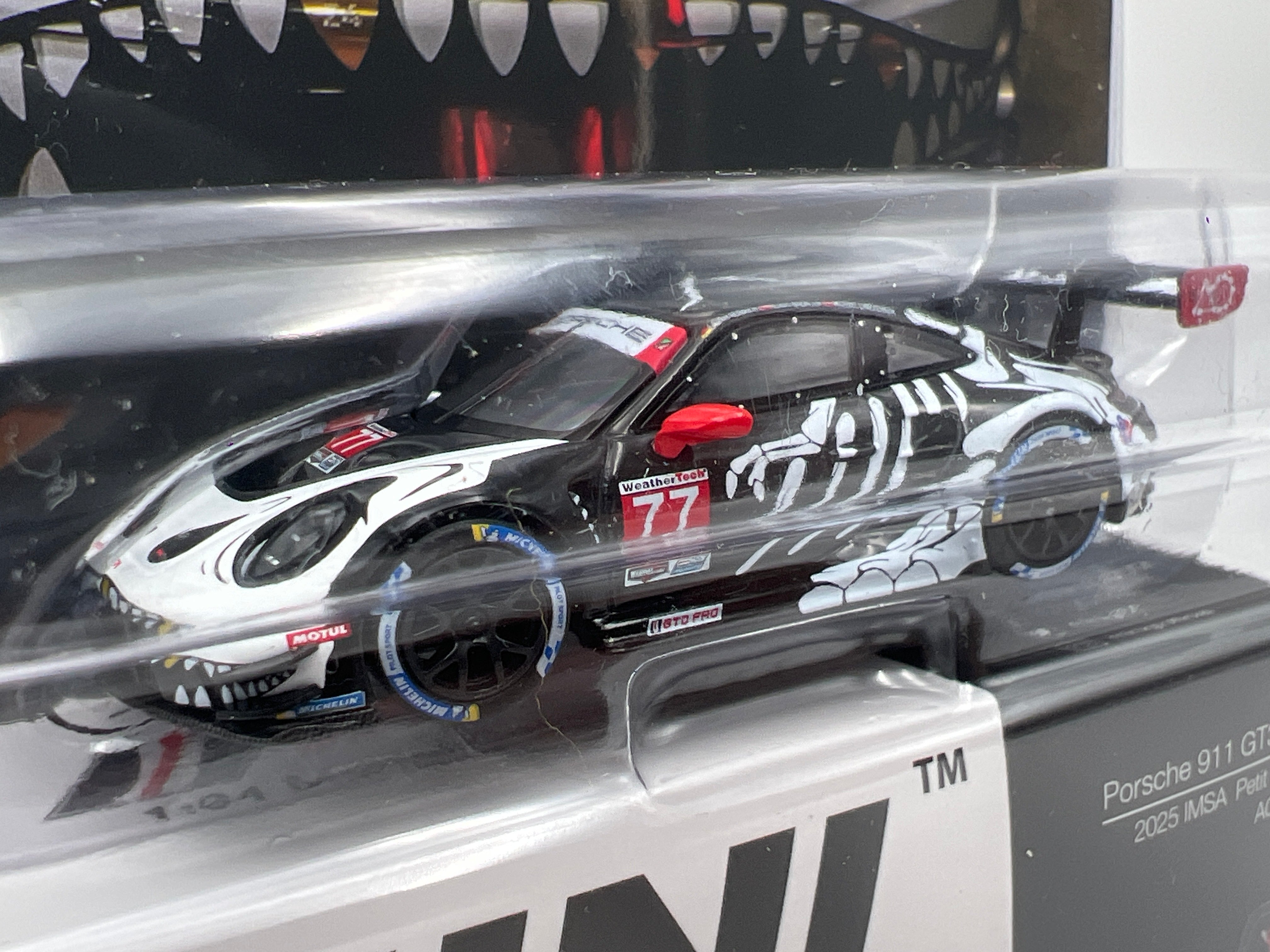 Mini GT #1143 Porsche 911 GT3 R #77 Skeleton Rexy 2025 IMSA AO