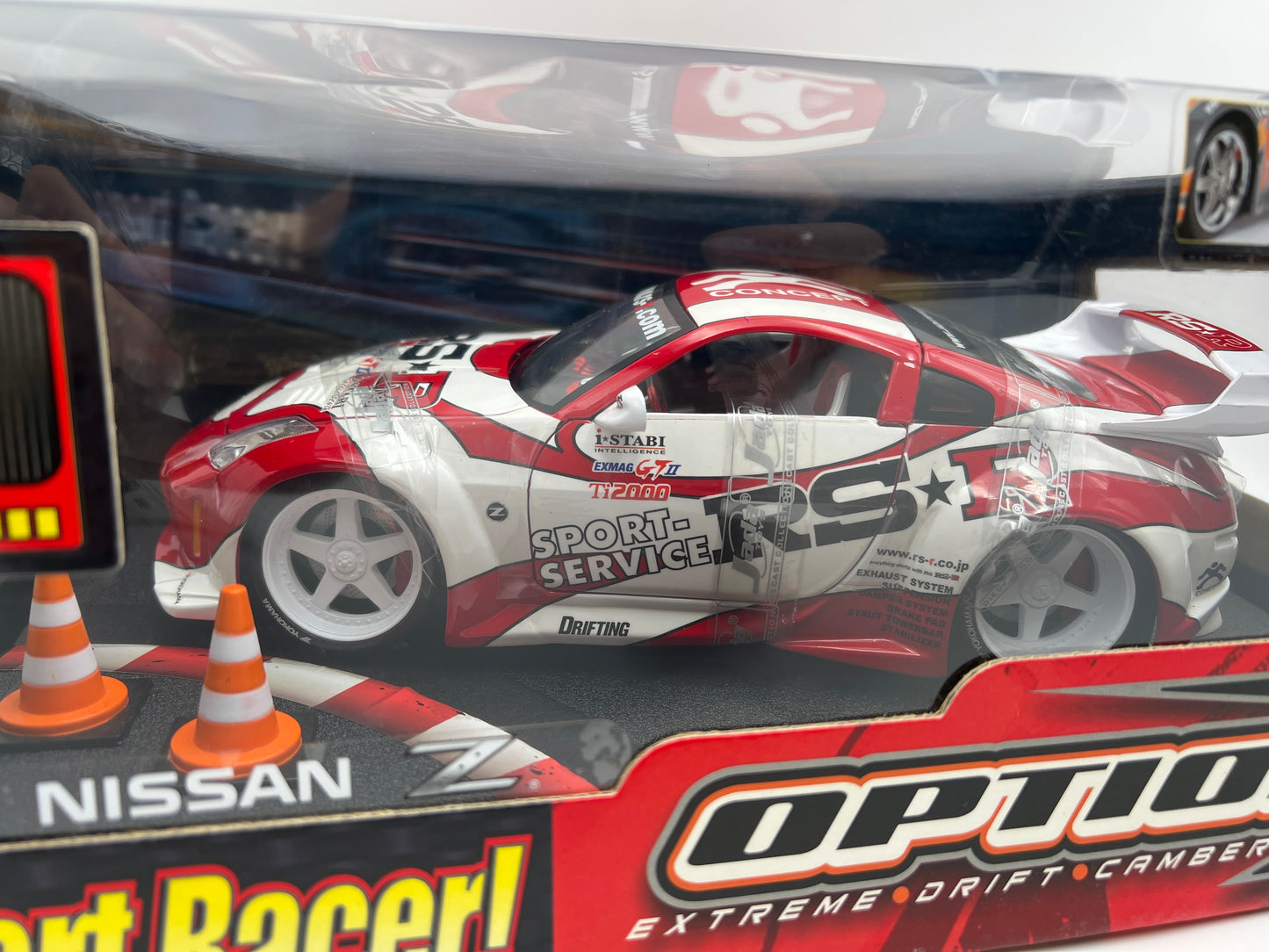 Jada 1:18 Scale Import Racer Option D Nissan Z Red/White W/Adjustable Camber