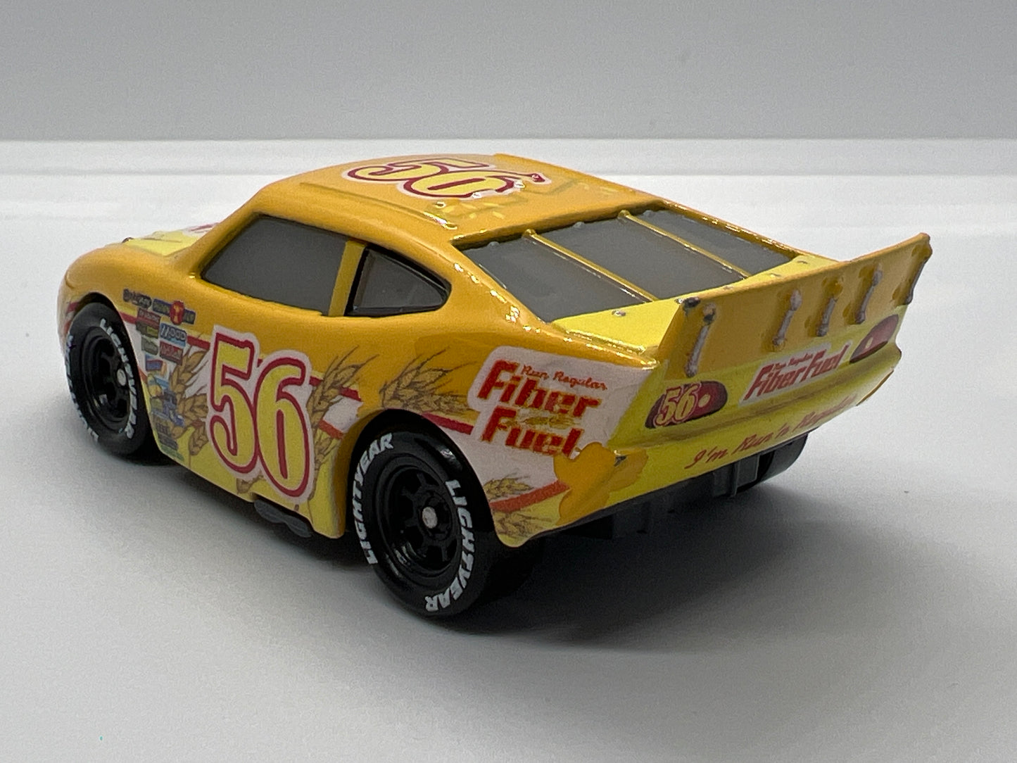 Disney Pixar Cars #42 Brusho Curber Fiber Fuel Yellow Loose