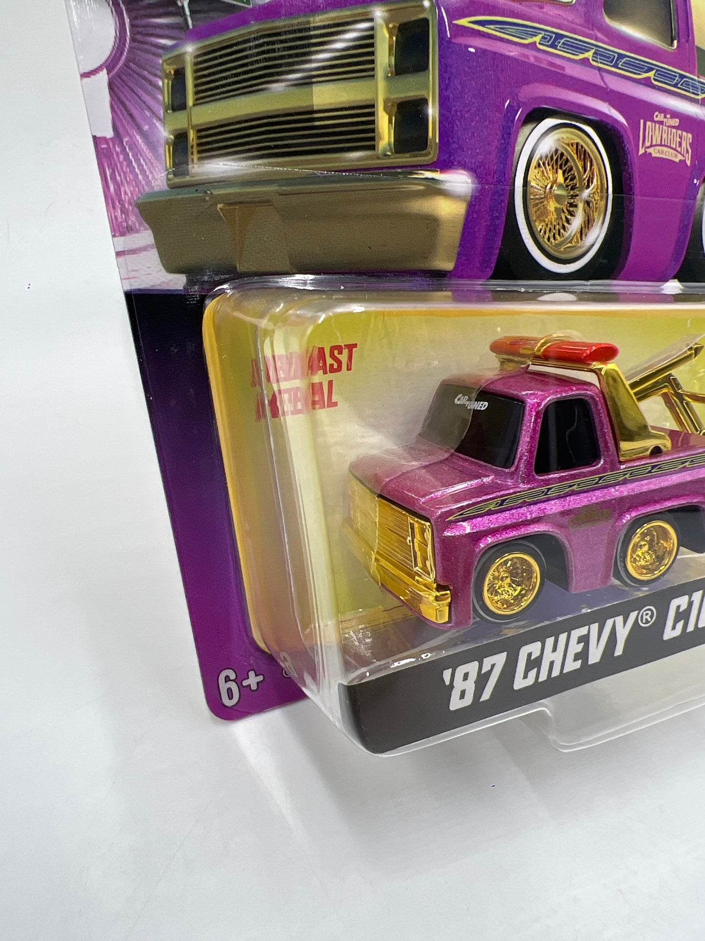 2025 MGA Car Tuned Series 8 #3 87 Chevy C10 Pink 183C