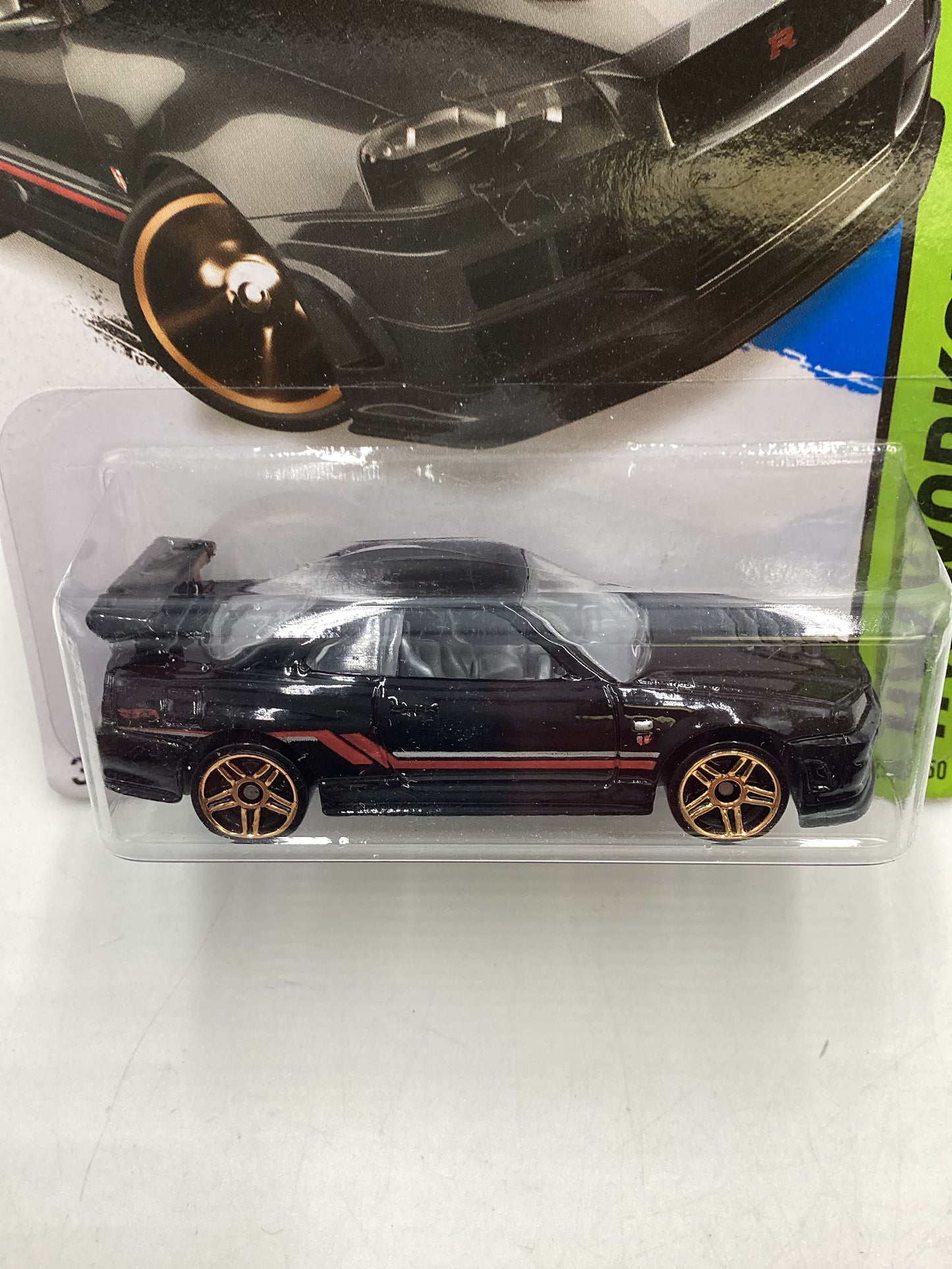 2014 Hot Wheels #230 Nissan Skyline GT-R (R34) Black with Protector