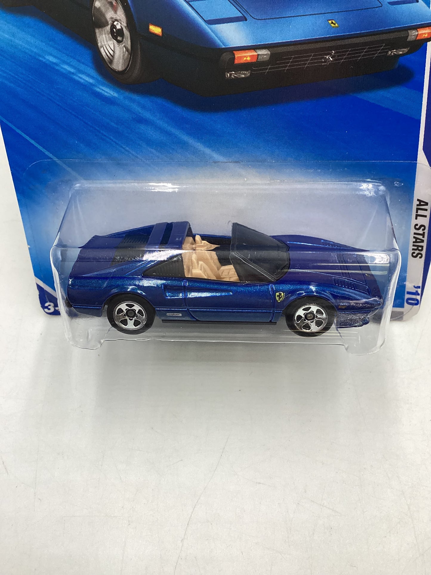 2010 Hot Wheels #128 Blue Ferrari 308 GTS with protector