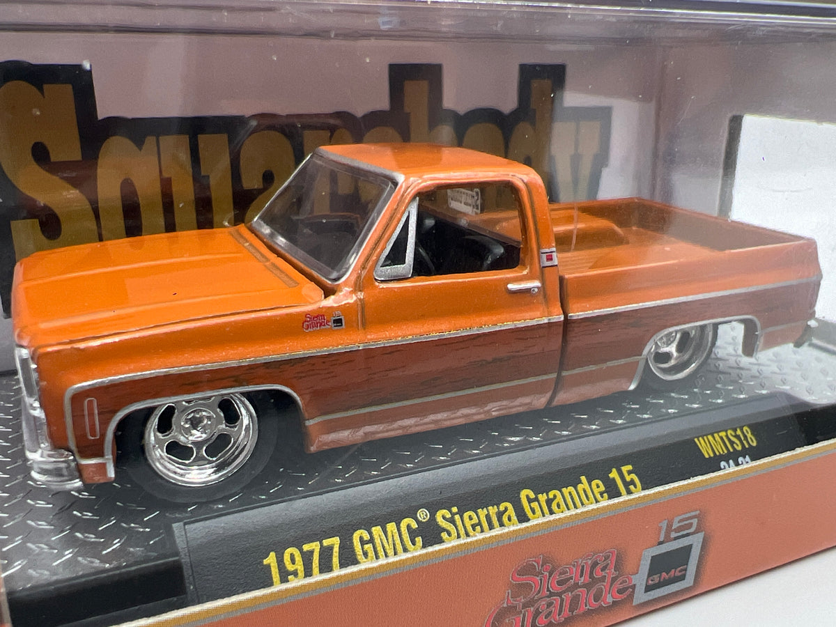 M2 Machines WMTS18 Squarebody Syndicate 1977 GMC Sierra Grande 15 Orange