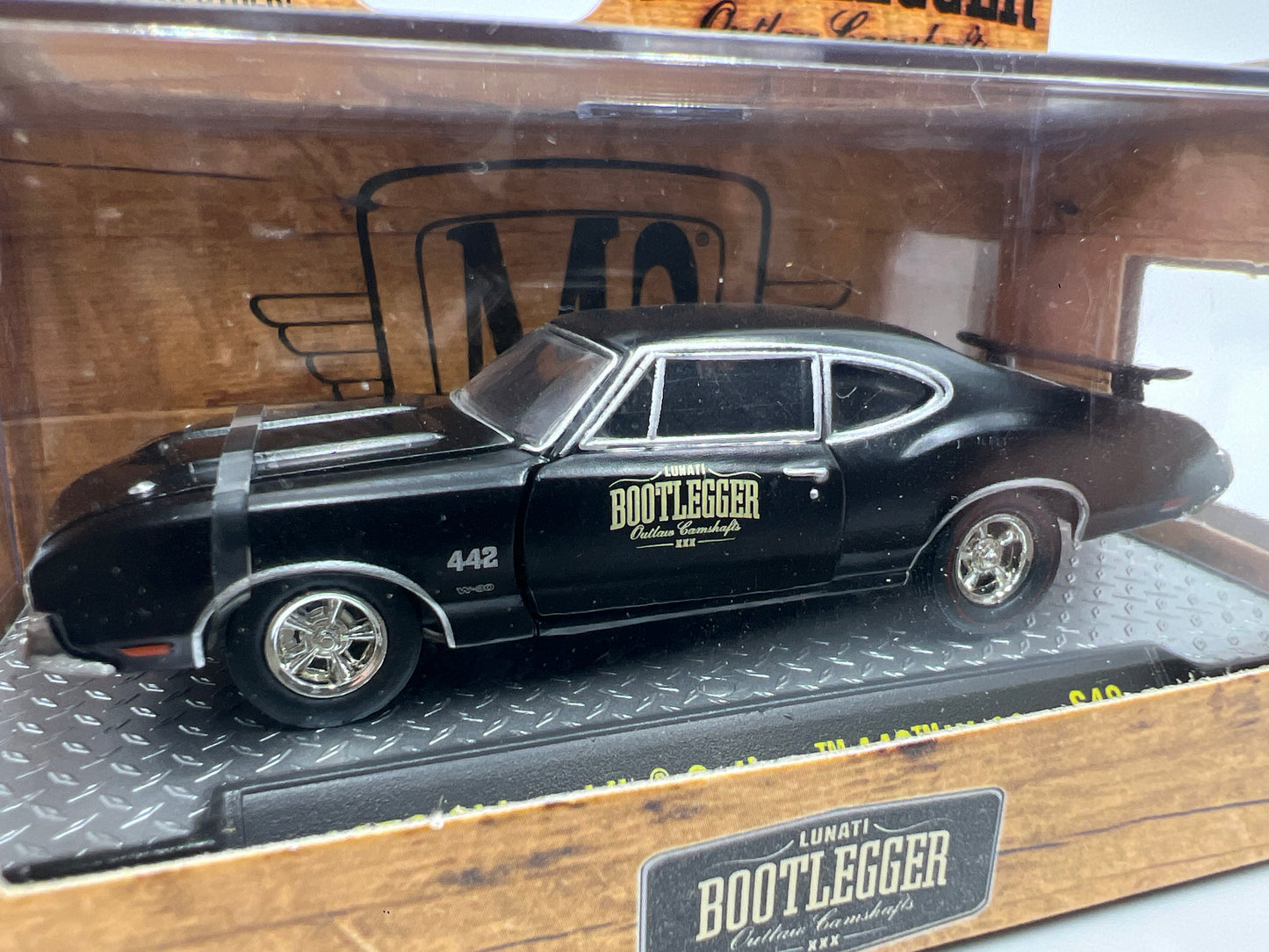 M2 Machines Lunati Bootlegger 1970 Oldsmobile Cutlass 442 W-30 Black S48