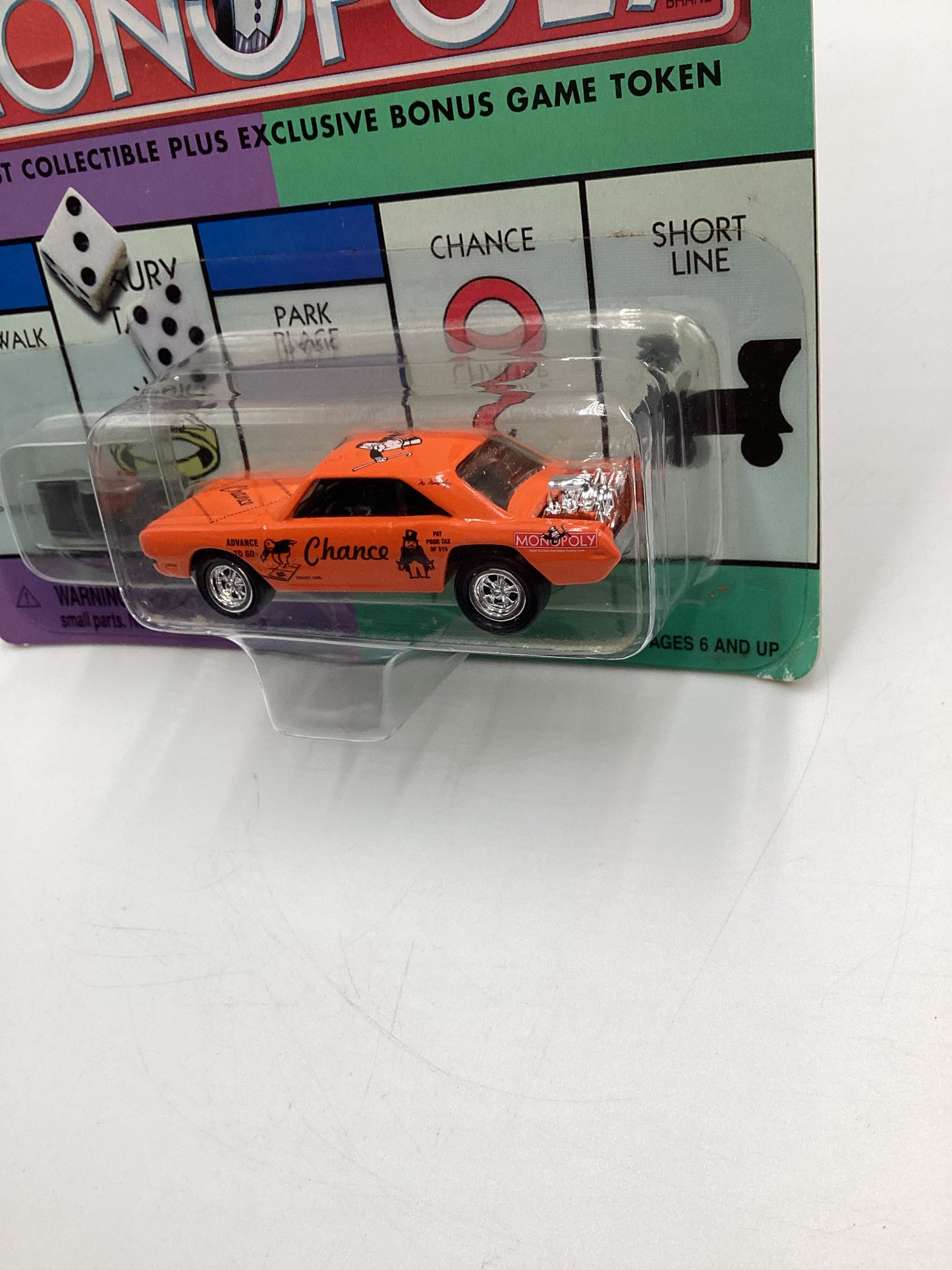 Johnny Lightning Monopoly Chance W/Token 1970 Dodge Dart Orange