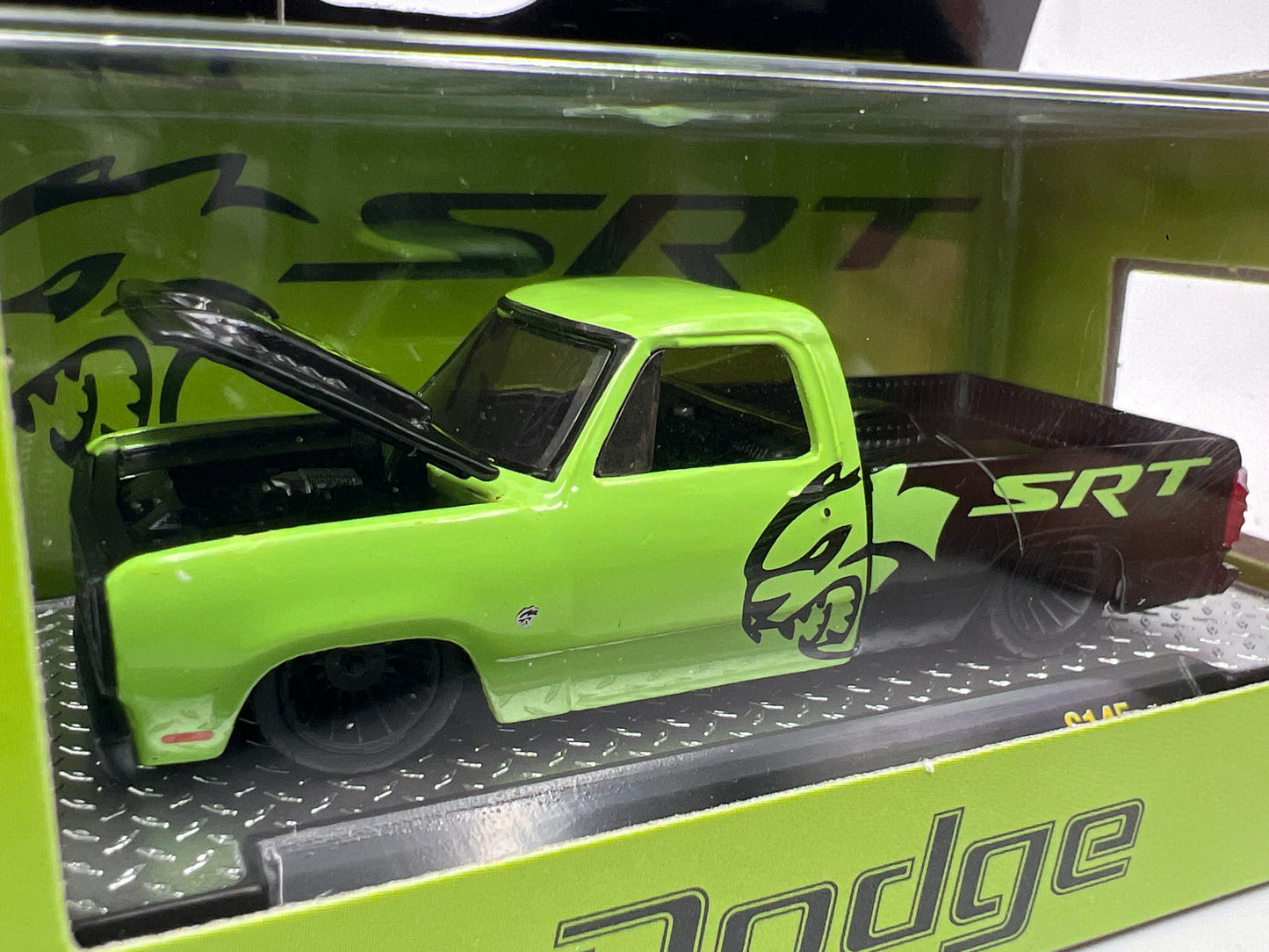 M2 Machines S145 1976 Dodge Adventurer 150 Custom Light Green/Black