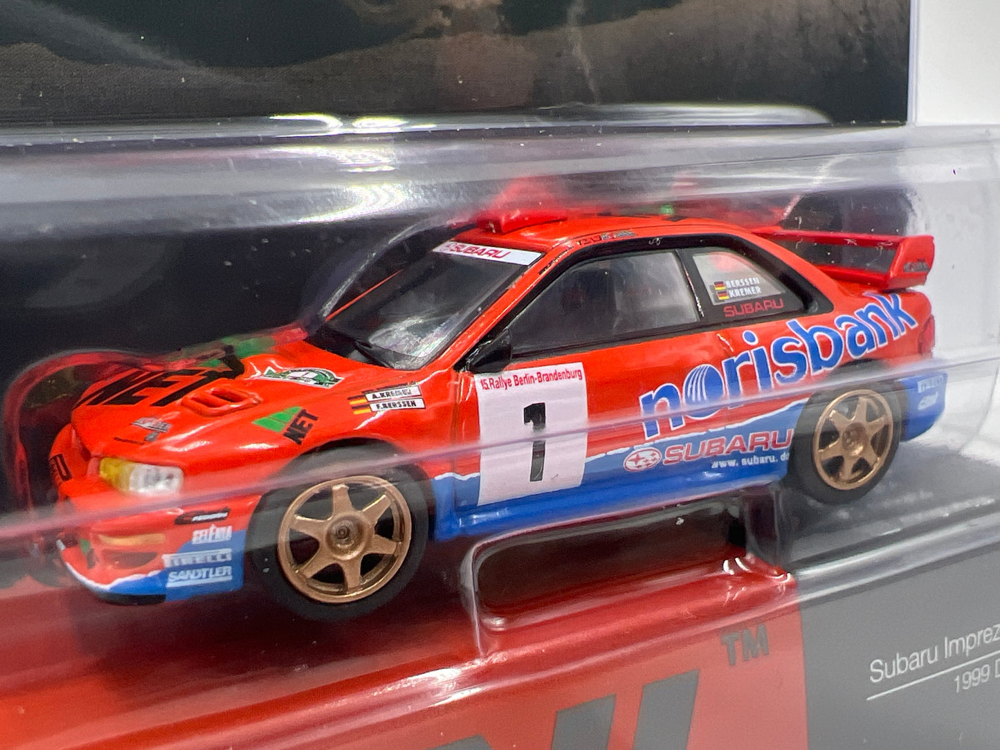 Mini GT #1140 Subaru Impreza WRC97 #1 1999 DRM Champion Orange/Blue 230D