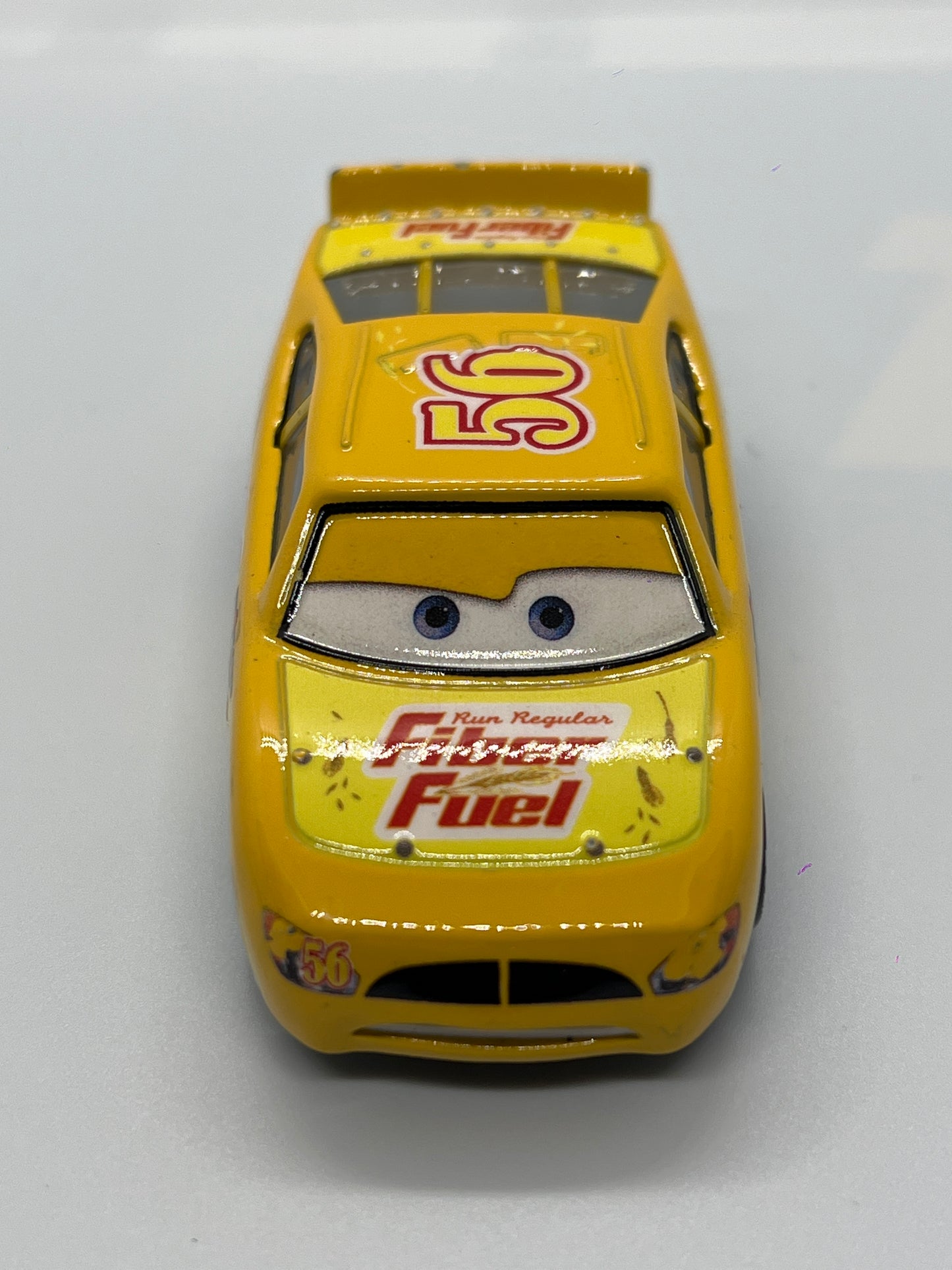 Disney Pixar Cars #42 Brusho Curber Fiber Fuel Yellow Loose