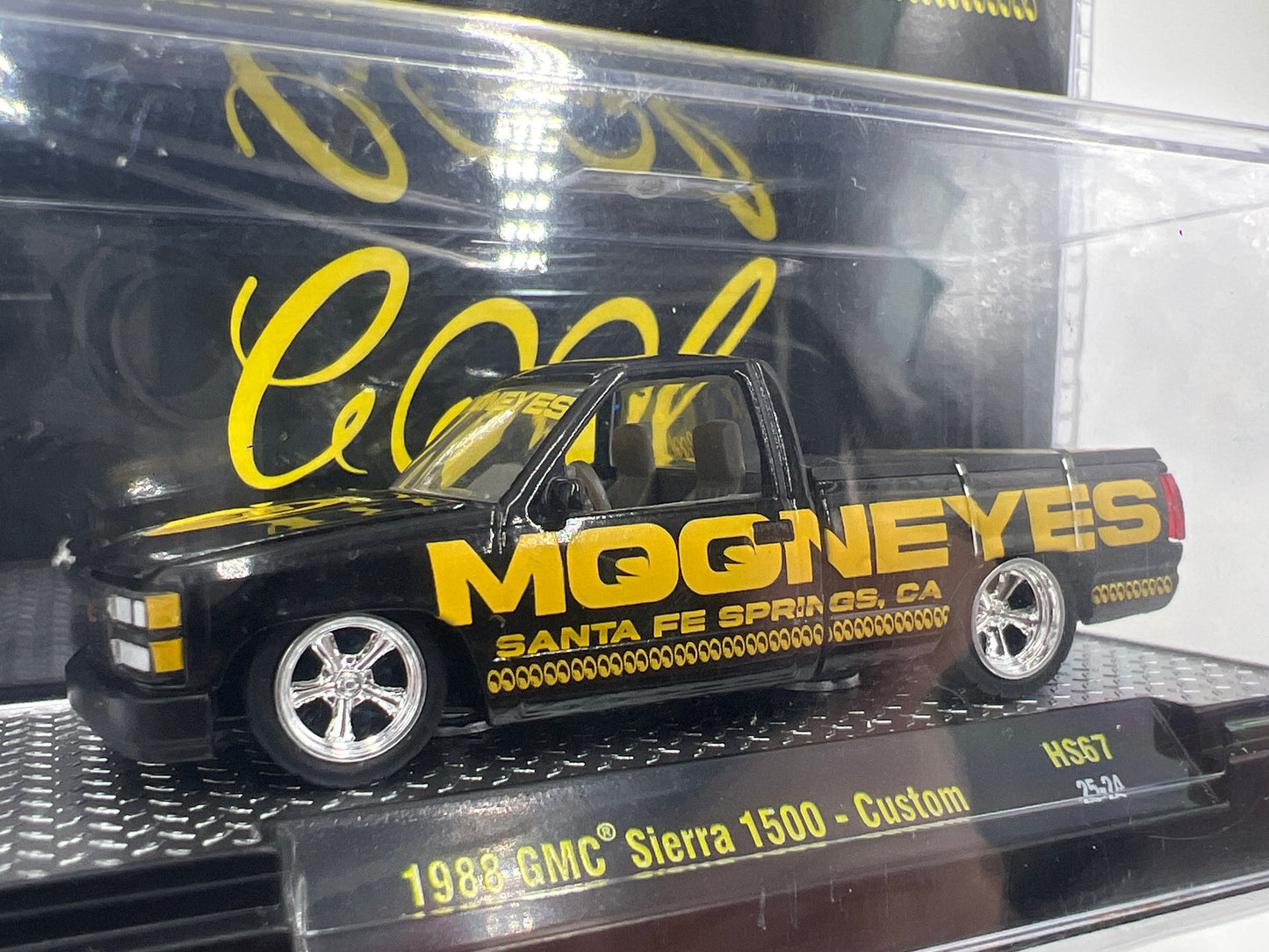 M2 Machines Hobby Lobby Exclusive 1/4400 Mooneyes OBS 1988 GMC Sierra 1500 Custom HS67