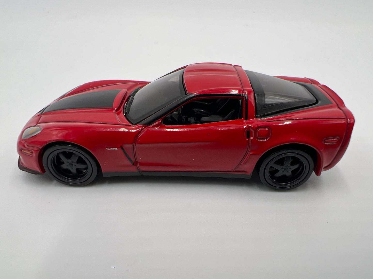 Auto World 1/64 Target Exclusive Deluxe 4 Pack Release 2 Version A 2010 Chevy Corvette Z06 Red Loose