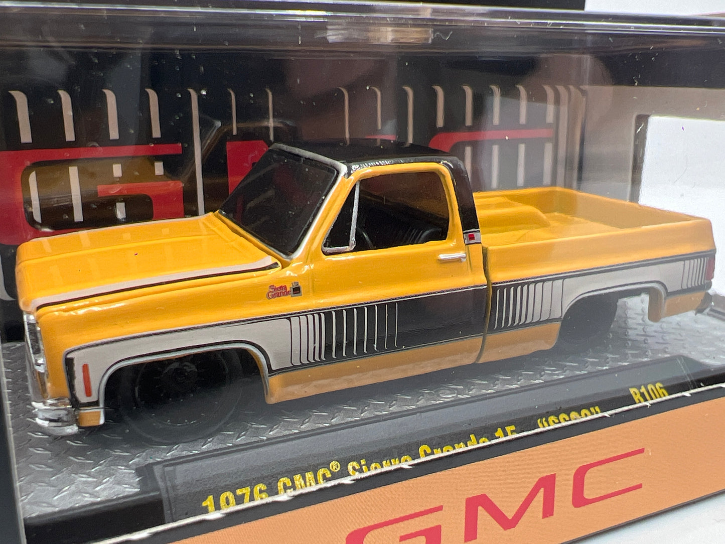 M2 Machines R106 1976 GMC Sierra Grande 15 SS02 Orange