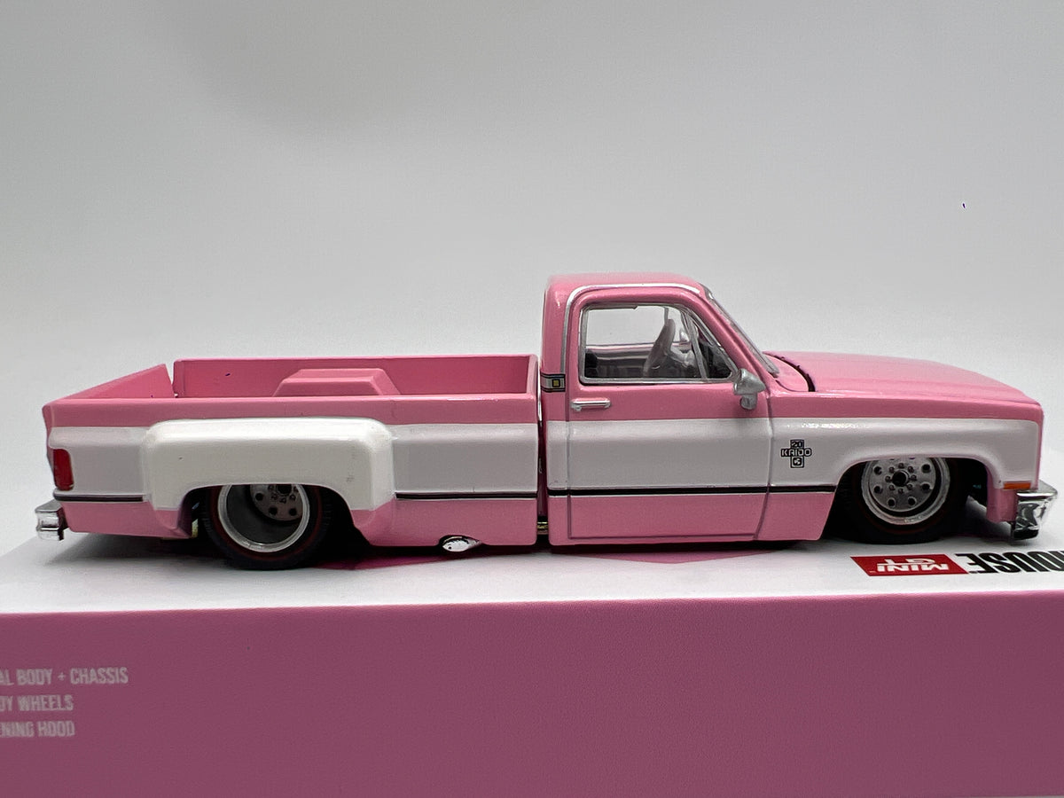 Mini GT x Kaido House #243 Chevrolet Silverado Dually Vintage Spec V2 Pink