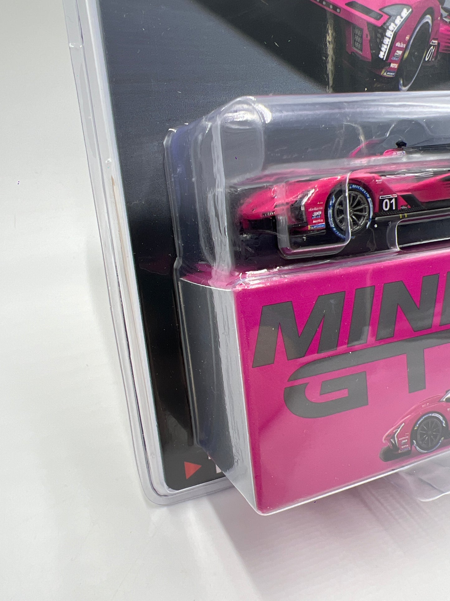 Mini GT #1010 Cadillac V-Series.R #01 2024 IMSA Petit Le Mans Cadillac Racing Pink/Black