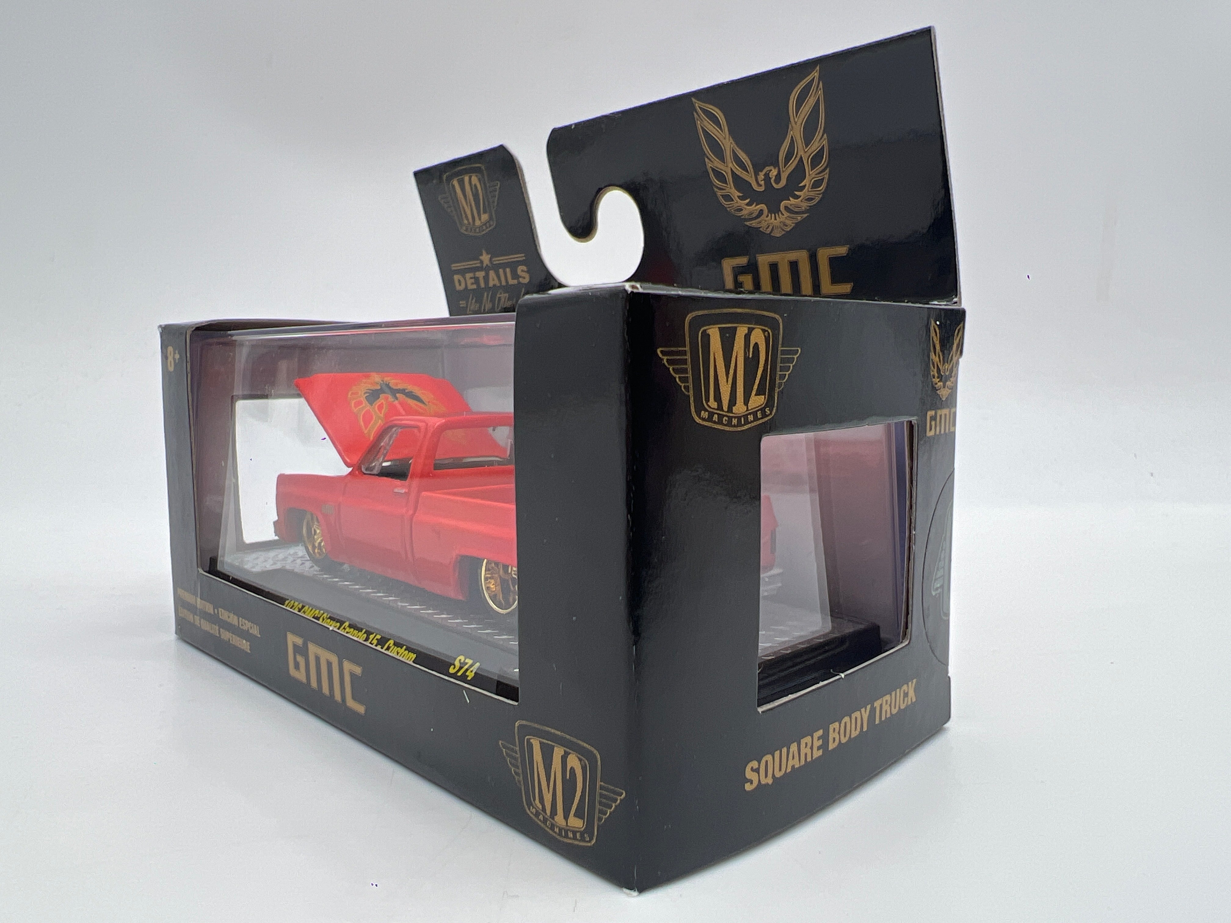 M2 Machines S74 1/3600 1976 GMC Sierra Grande 15 Custom Light Red