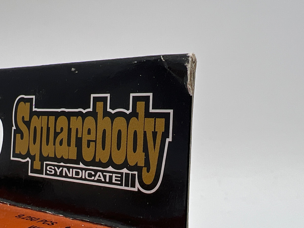 M2 Machines WMTS18 Squarebody Syndicate 1977 GMC Sierra Grande 15 Orange
