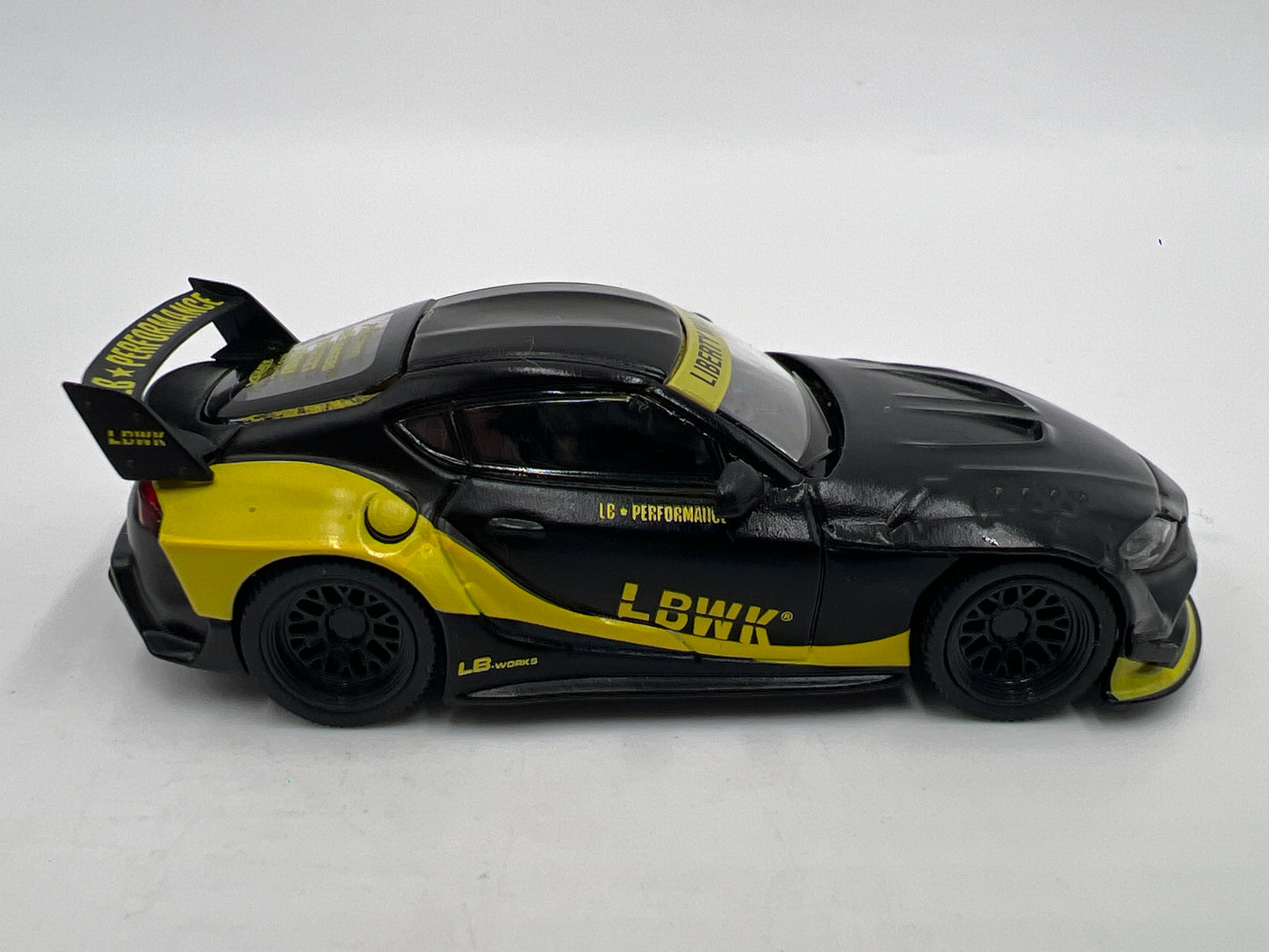 Mini GT #472 MiJo Exclusive Toyota GR Supra LB Works Black/Yellow