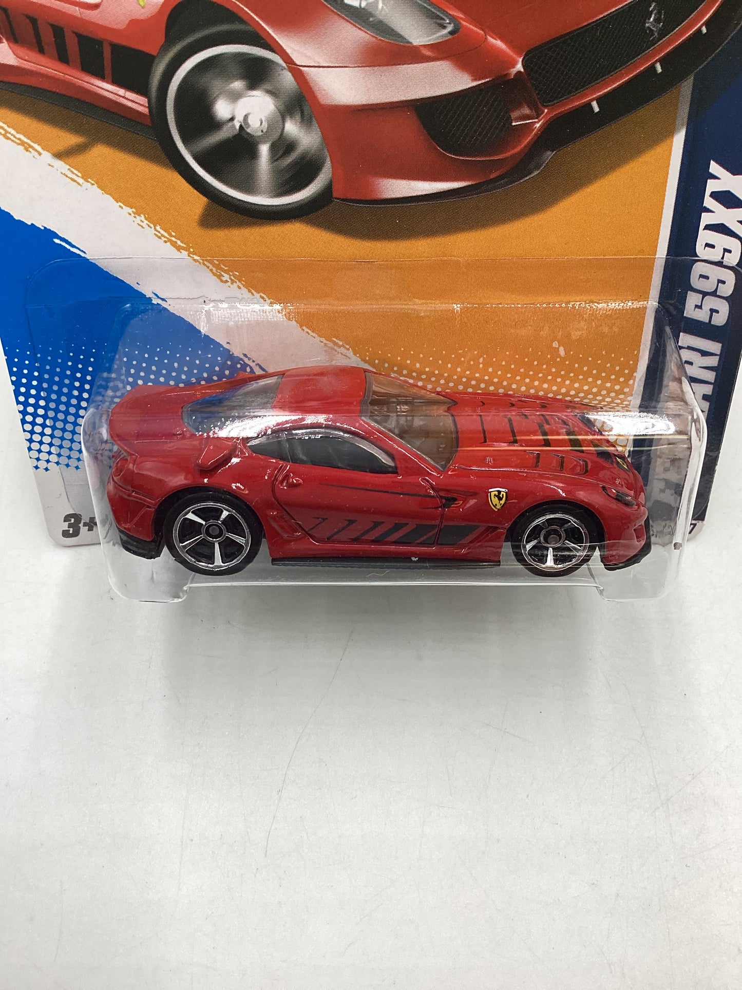 2012 Hot wheels #125 Red Ferrari 599XX with protector