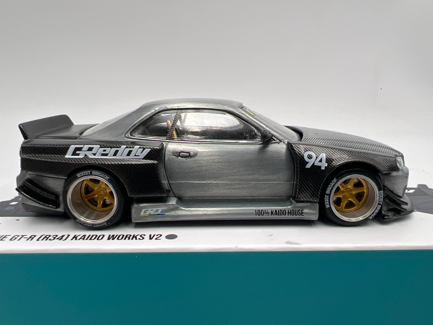 Mini GT Kaido House #222 CHASE Nissan Skyline GT-R R34 Kaido Works Carbon V2 GReddy